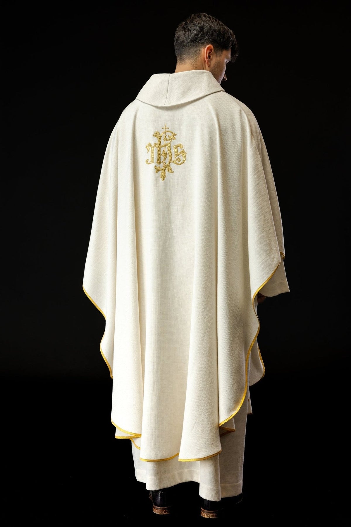 Ecru chasuble back view with gold embroidered monogram