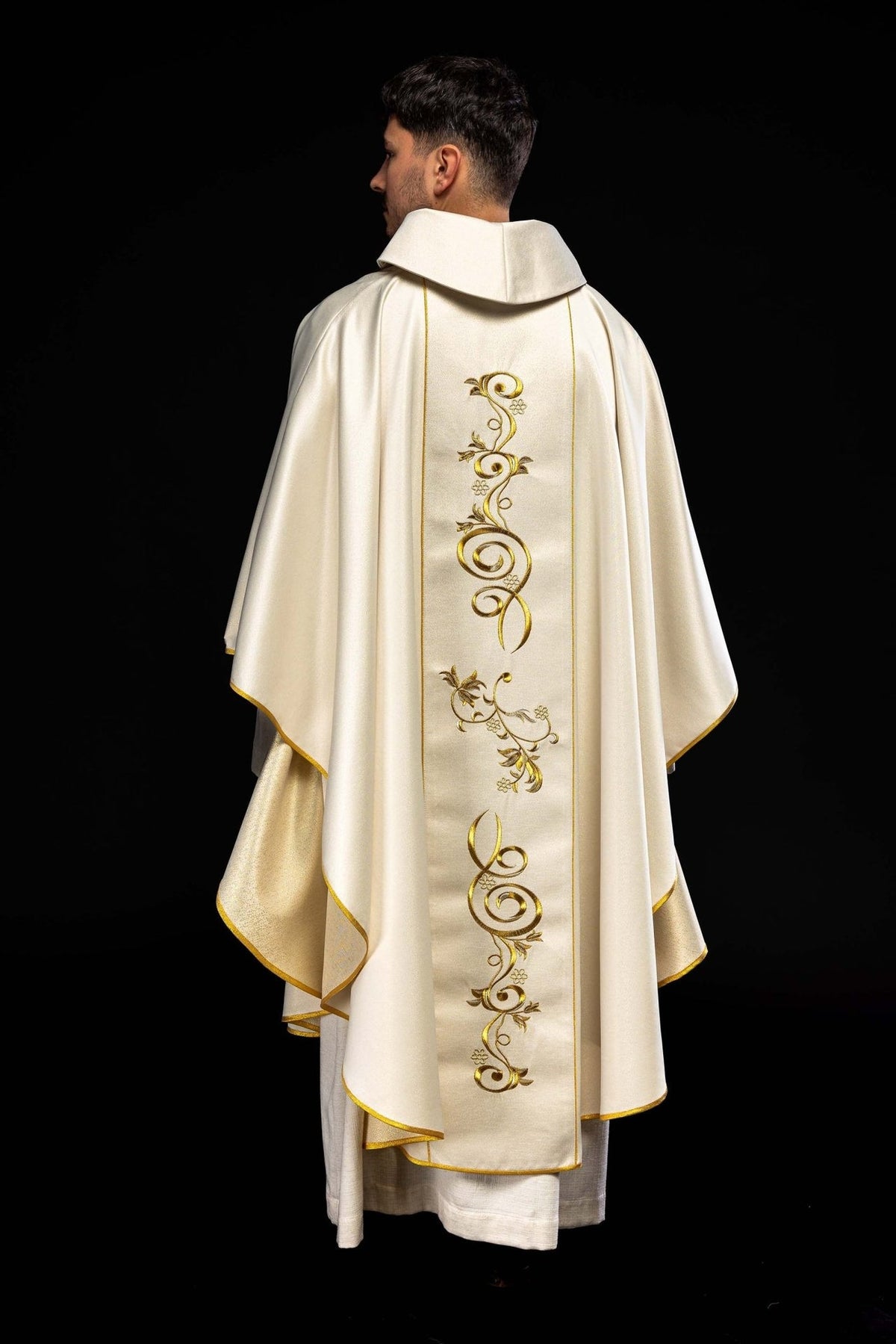 Ecru chasuble full back view with gold scroll embroidery and stand-up collar