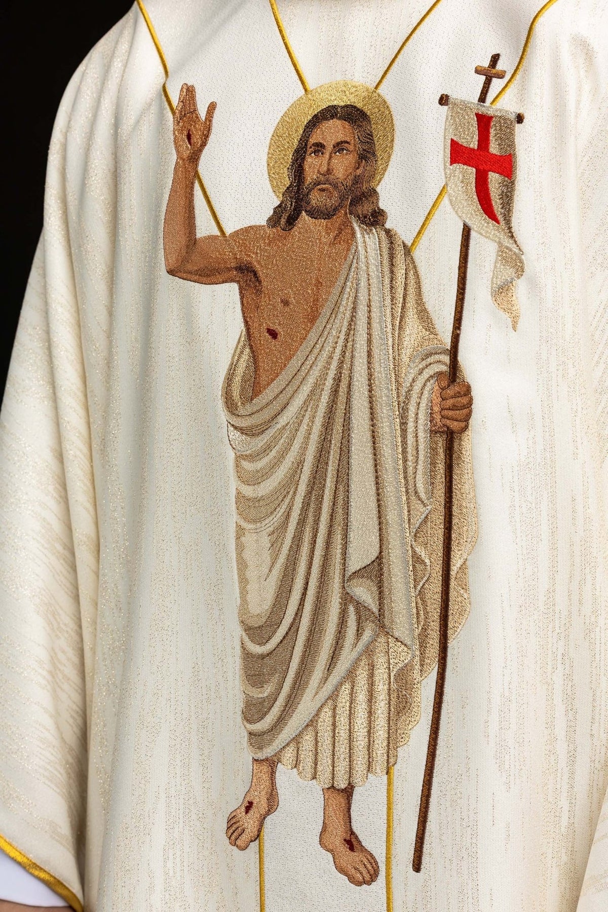 Chasuble close-up of the embroidered Paschal Lamb with skull and roses