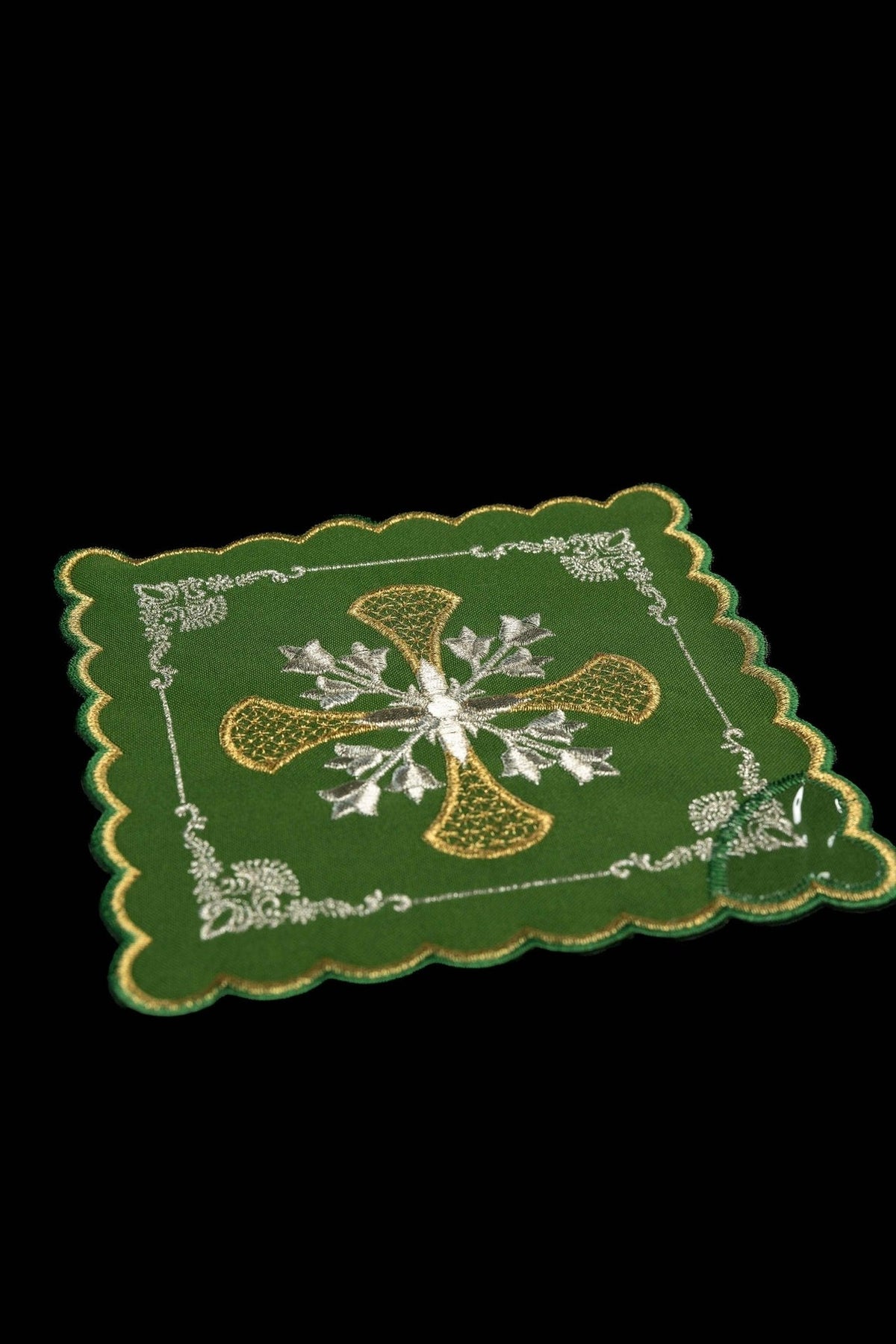 Green chalice pall close-up with gold and silver cross embroidery