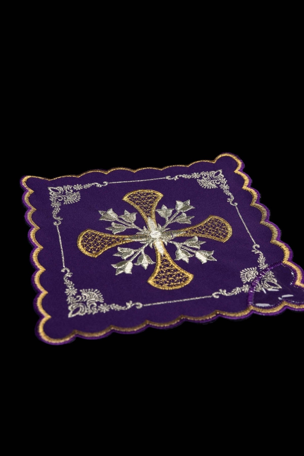Purple chalice pall close-up with gold and silver cross embroidery