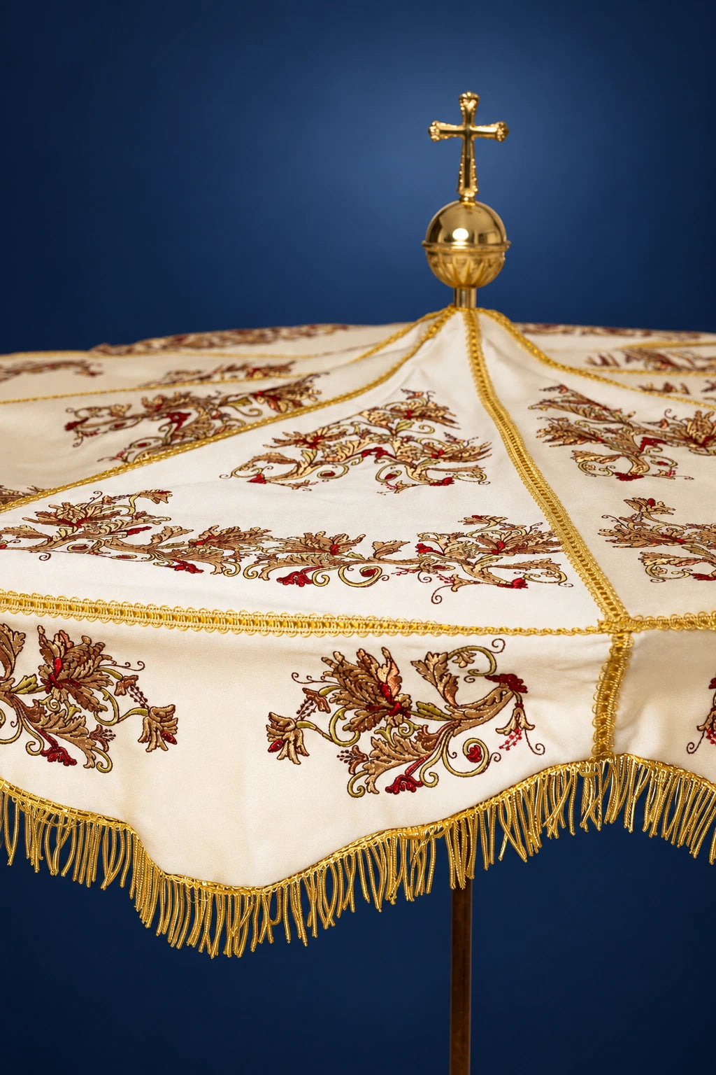 Ecru Processional Umbrella with Botanical Embroidery, close-up front view with gold trim and fringe