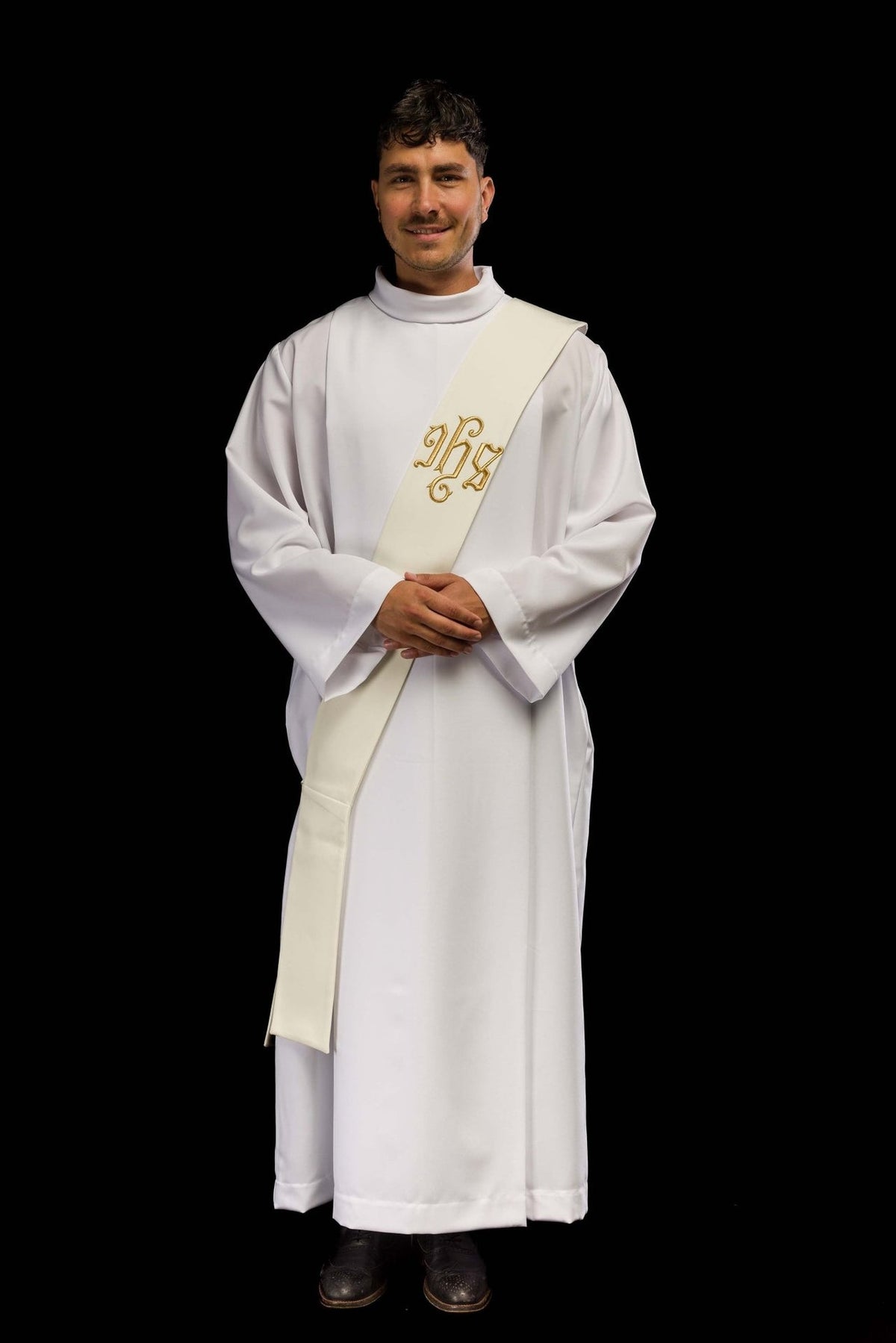IHS deacon stole worn in a full front view with ivory fabric and gold IHS embroidery