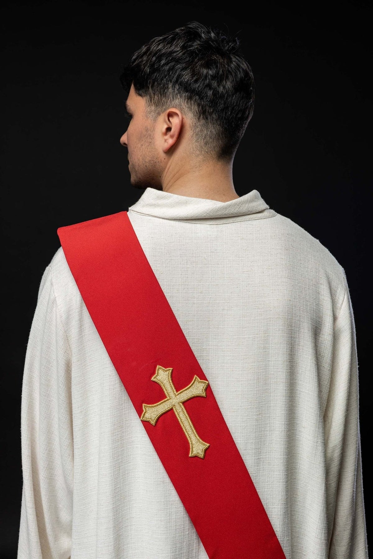 Red deacon stole back view with embroidered gold cross