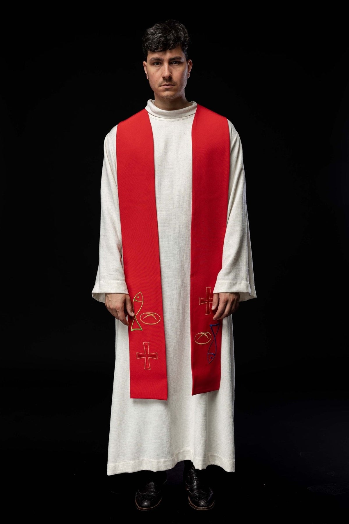 Red stole front view worn with fish, bread and cross embroidery