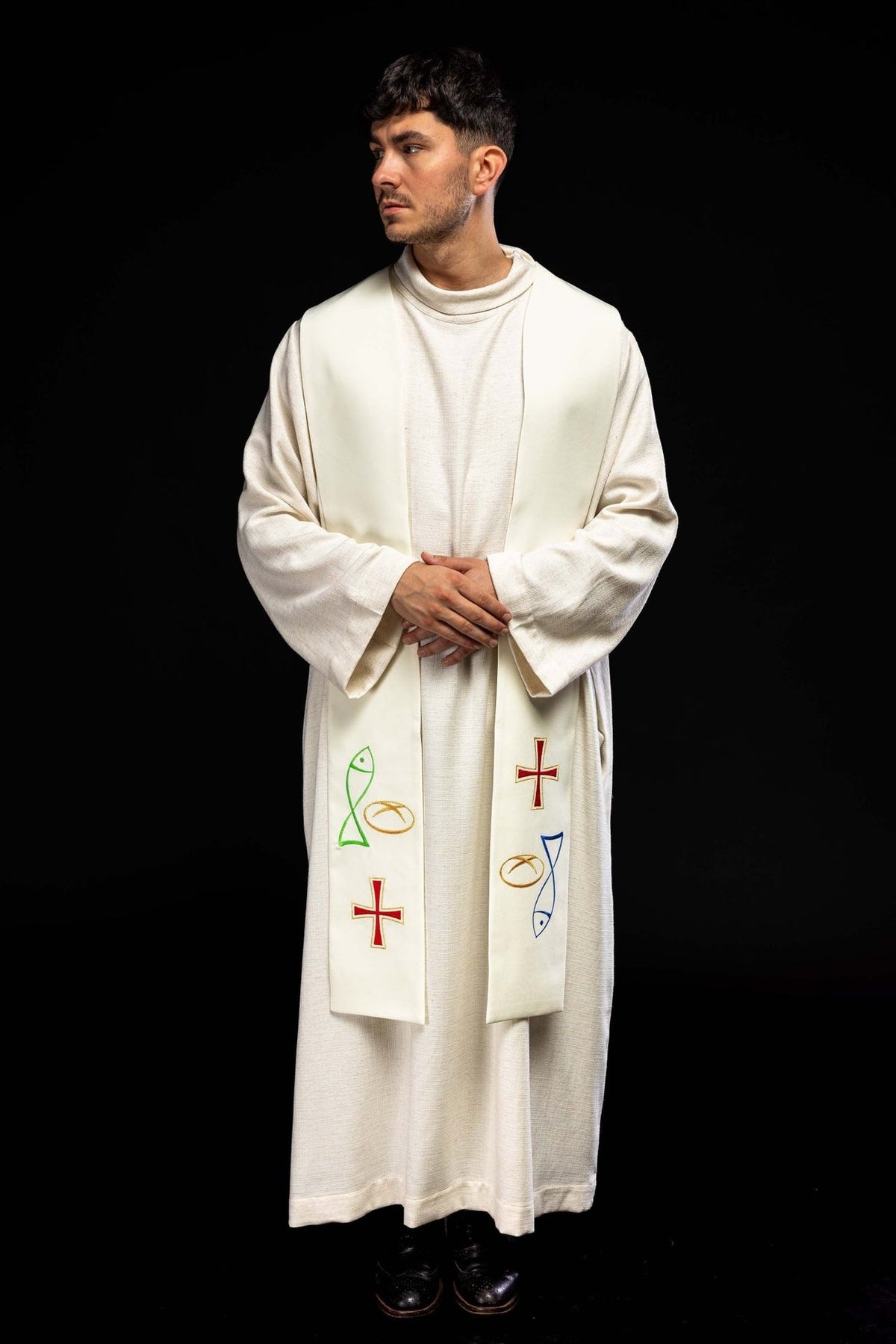 Embroidered ecru priest stole front view worn with fish, bread and cross motifs