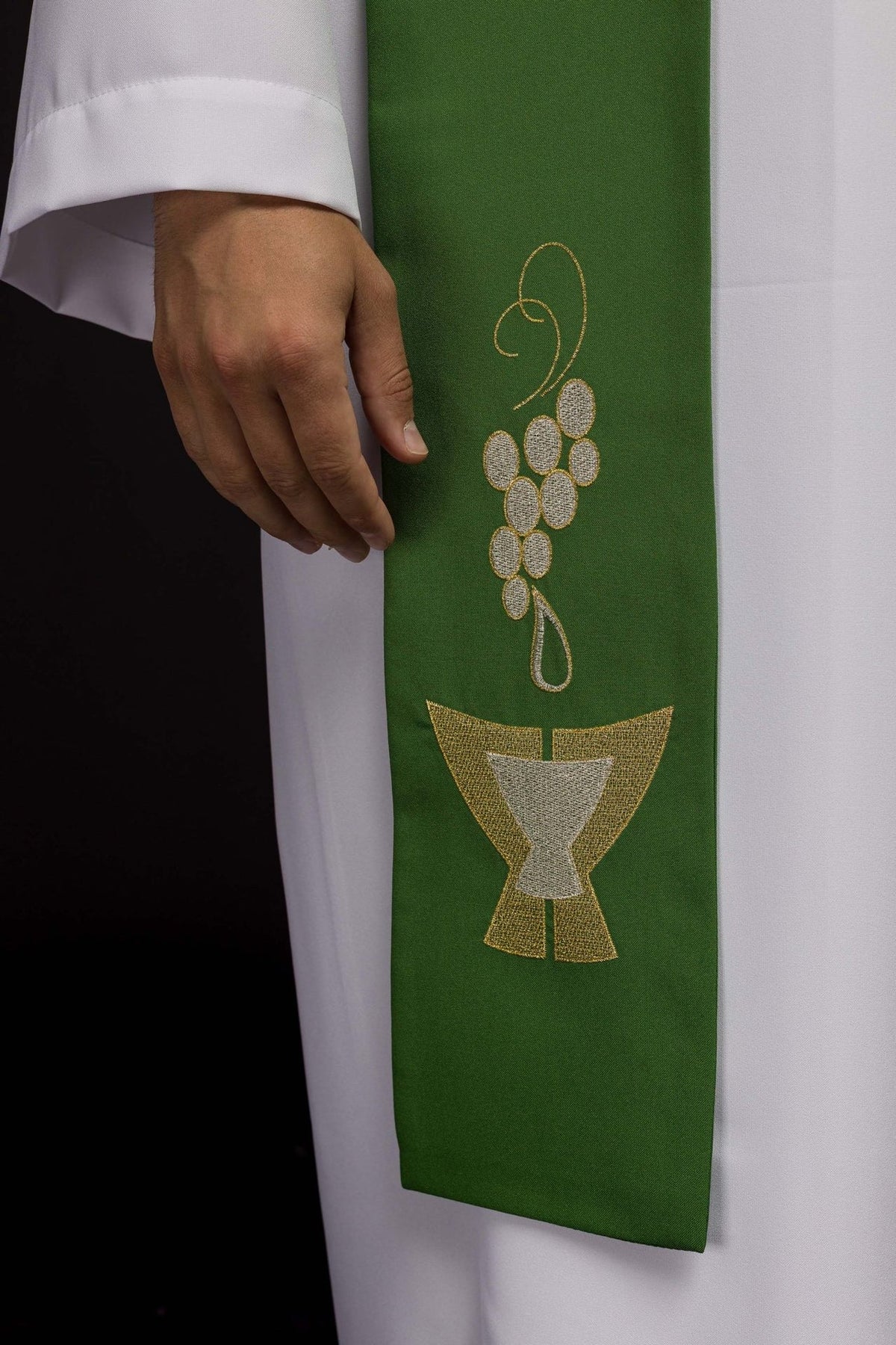 Green stole close-up showing embroidered grapes and chalice