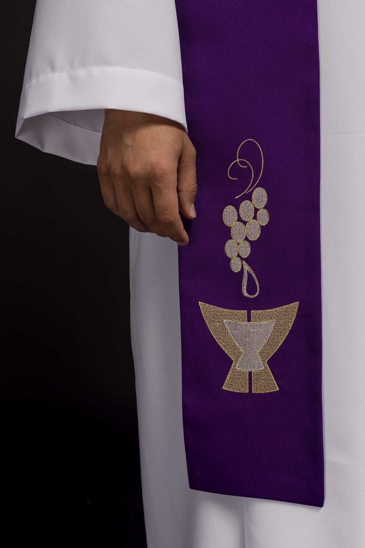 Purple priest stole close-up with embroidered grapes and chalice