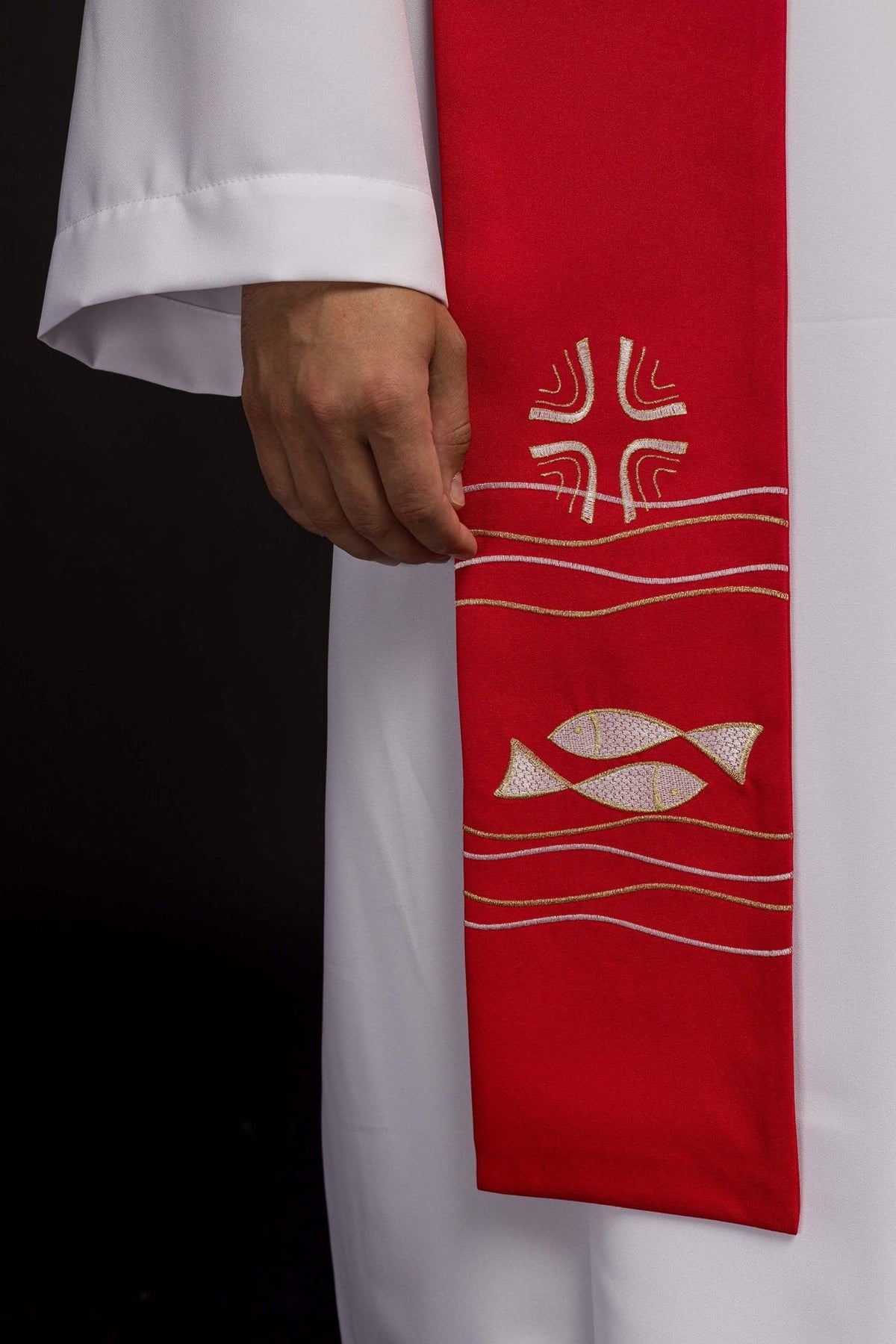 Red priest stole close-up showing cross and fish embroidery
