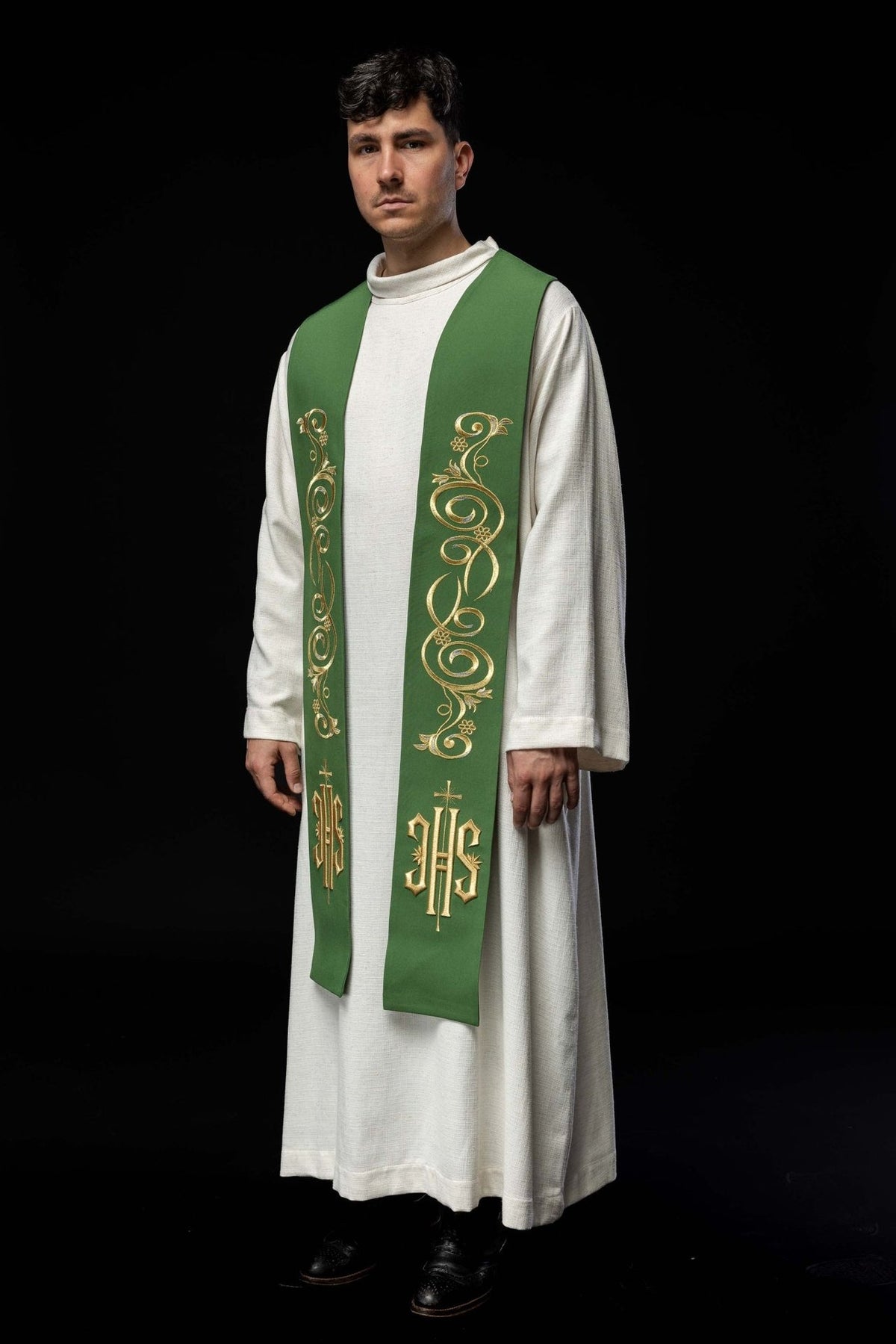 Green priest stole worn at an angle, showing the full embroidered front