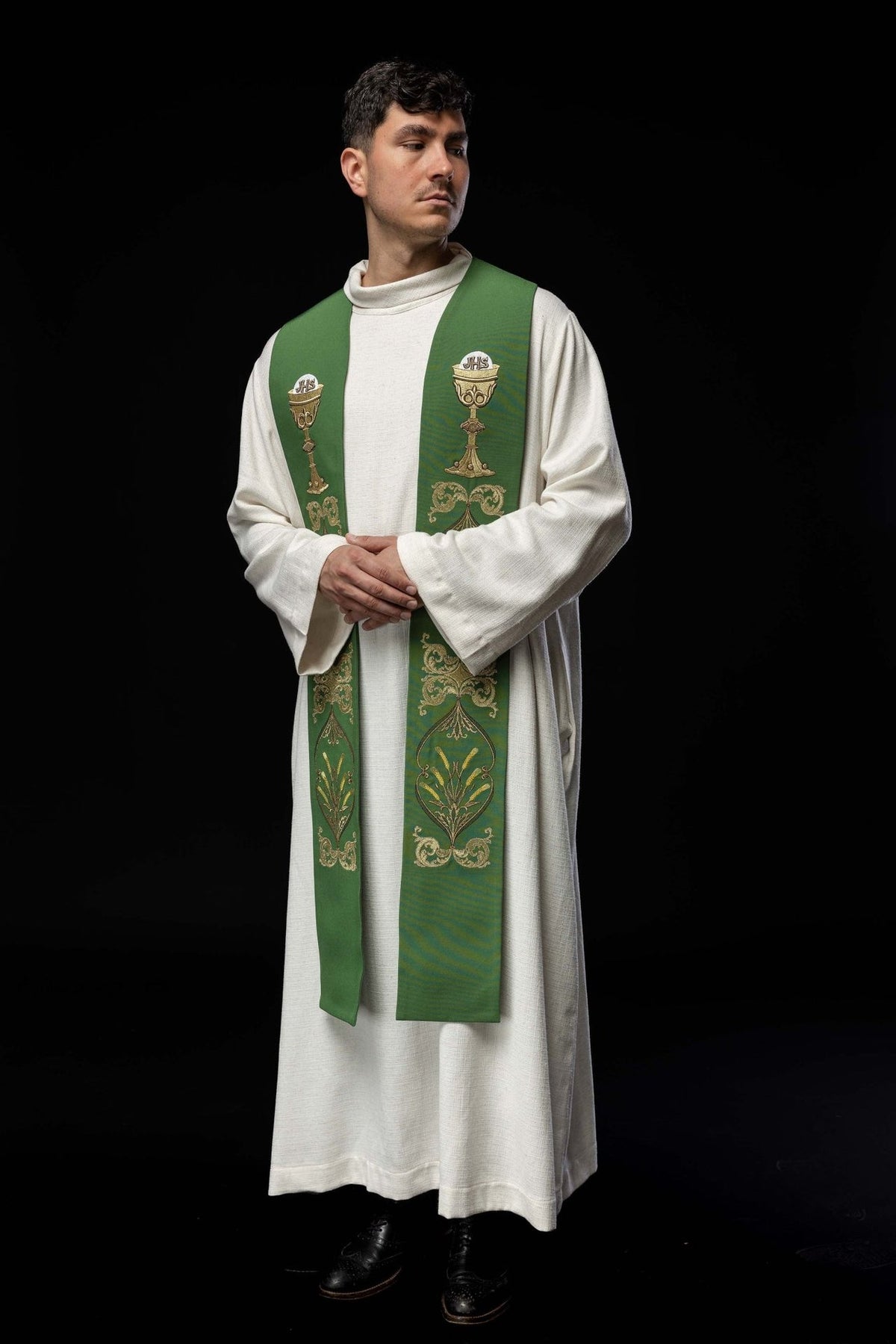Green priest stole worn in a full front view with IHS and chalice embroidery
