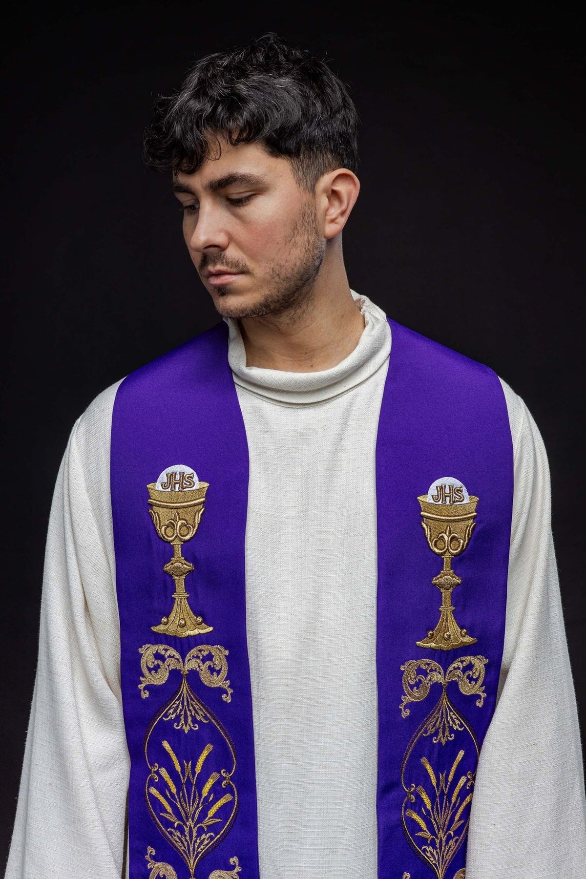 Purple stole lower front detail with gold floral embroidery