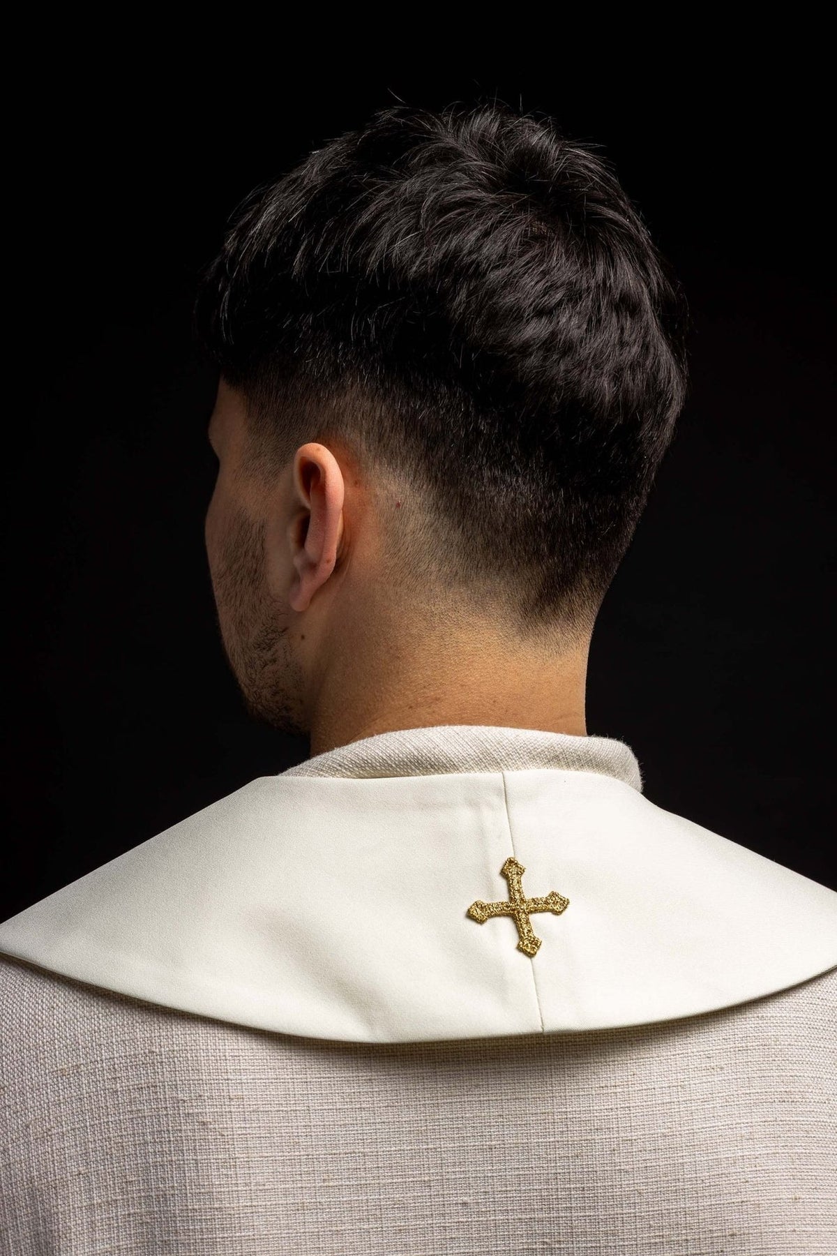 Ecru priest stole back view with small gold cross embroidery
