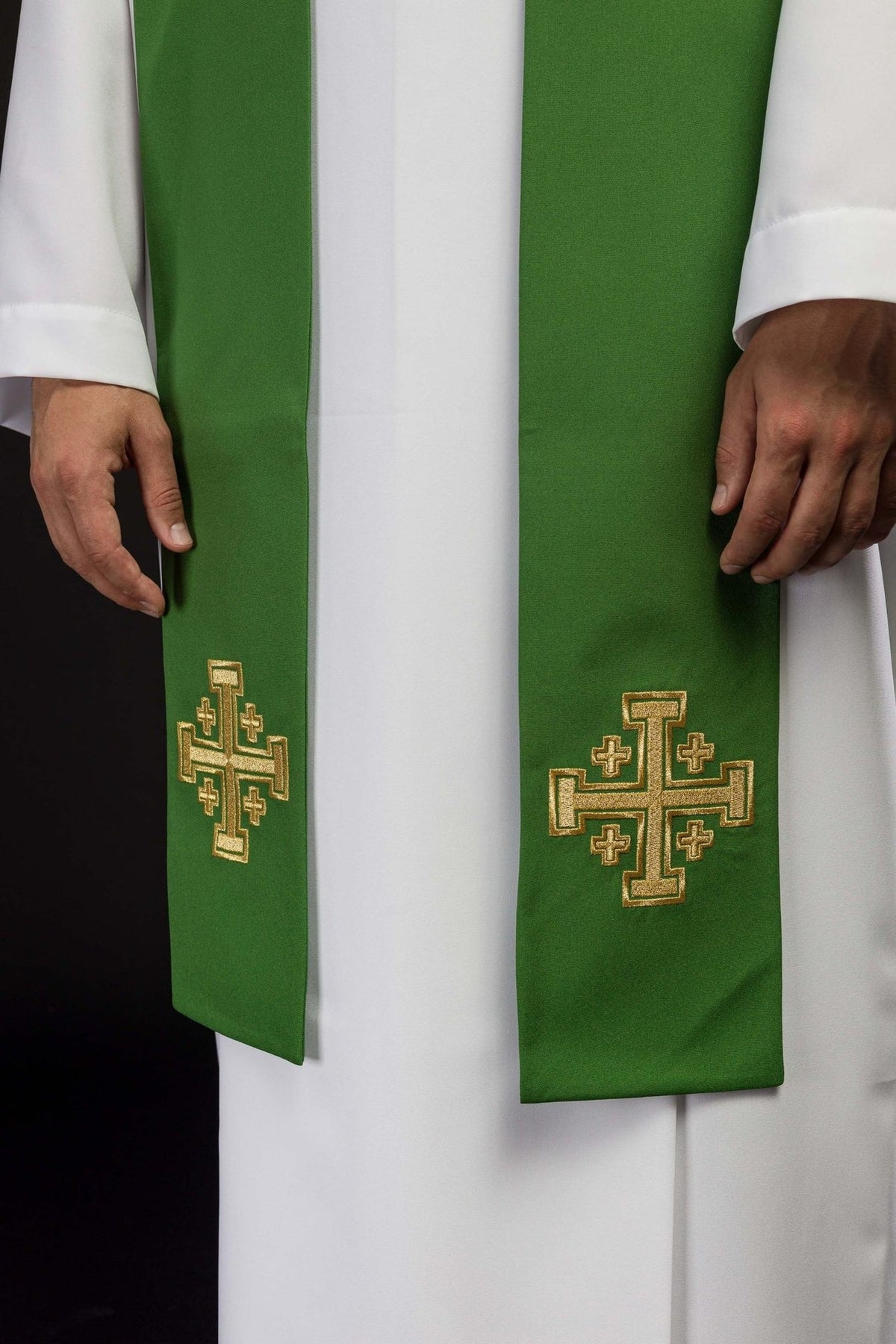 Green priest stole close-up with embroidered Jerusalem crosses