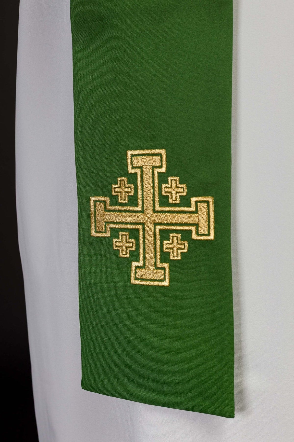 Green stole close-up showing one embroidered Jerusalem cross