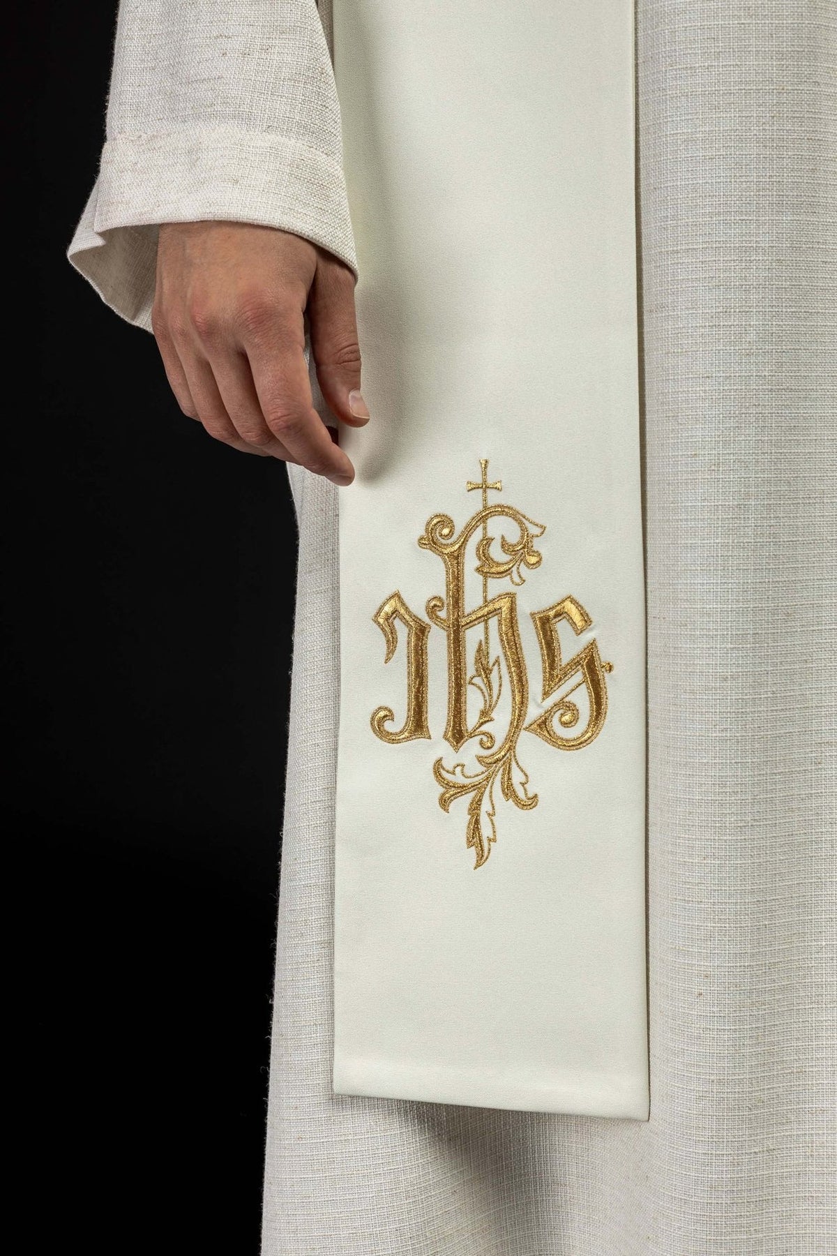 IHS stole close-up showing gold embroidery on the white front panel