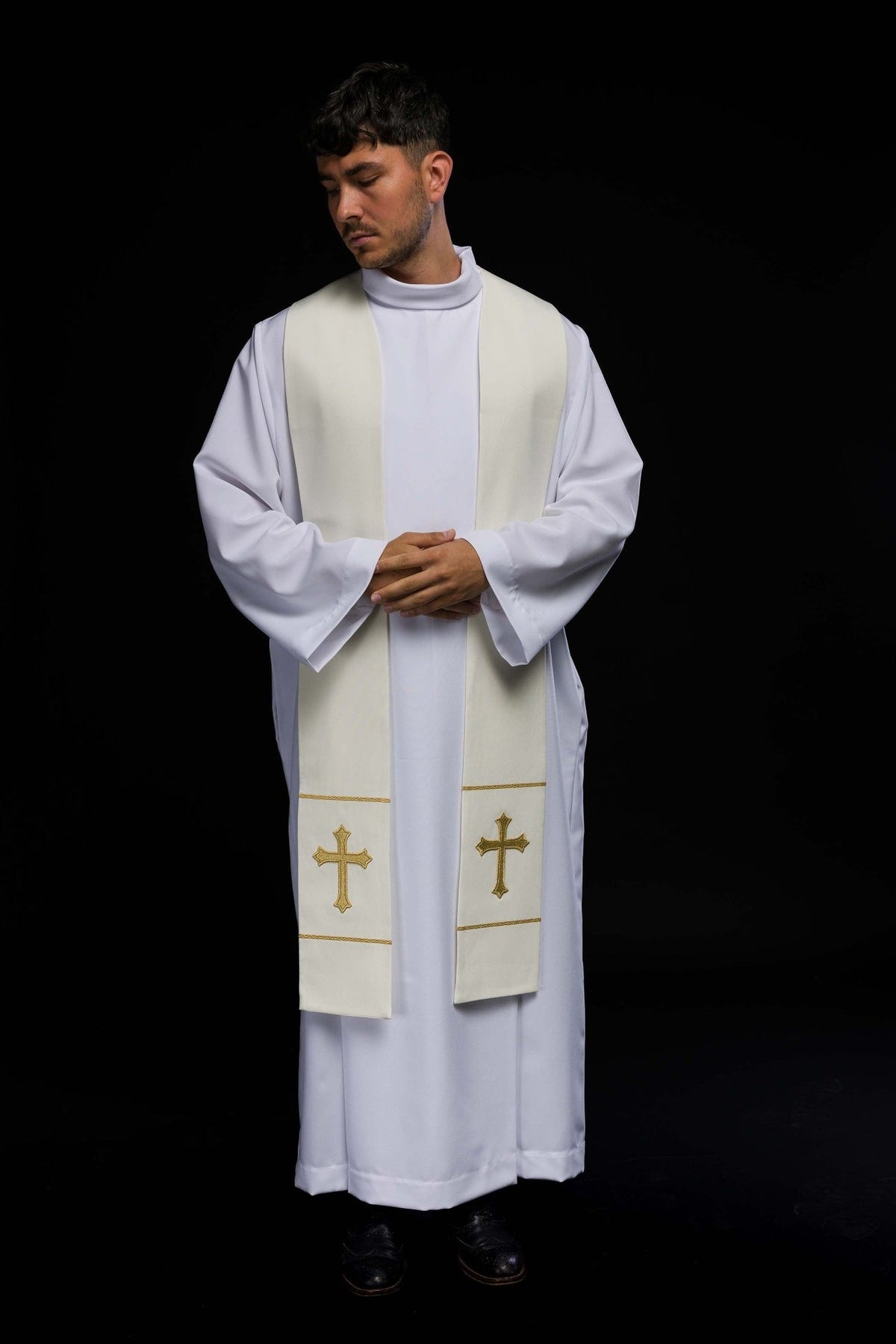 Ecru priest stole front view worn, showing paired gold cross embroidery