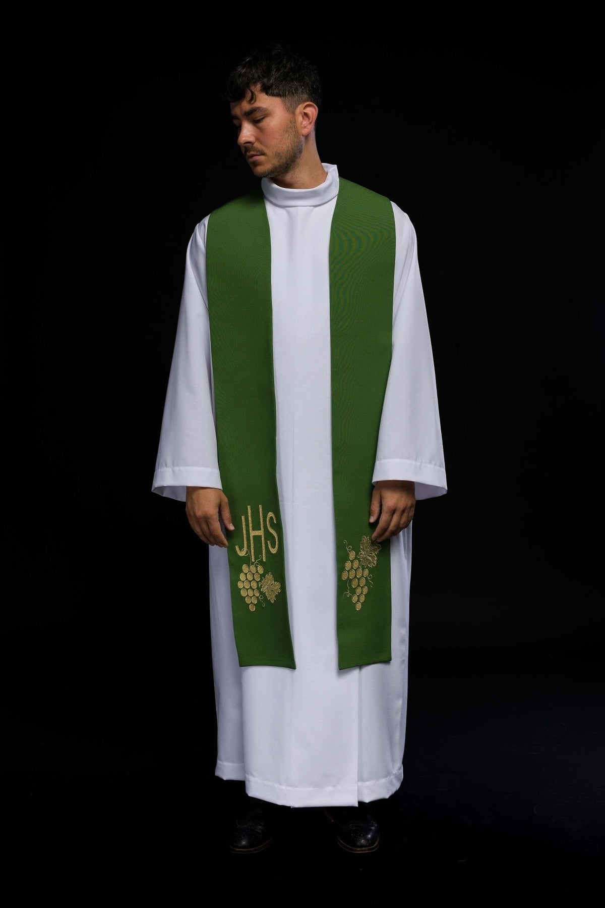 Green stole worn front view with IHS and grapes embroidery