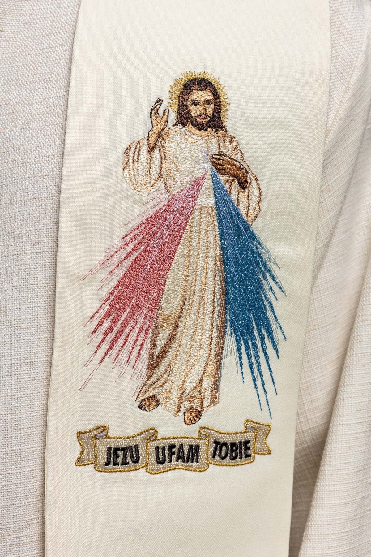 Priest stole close-up showing embroidered Divine Mercy and Jesus, I trust in You