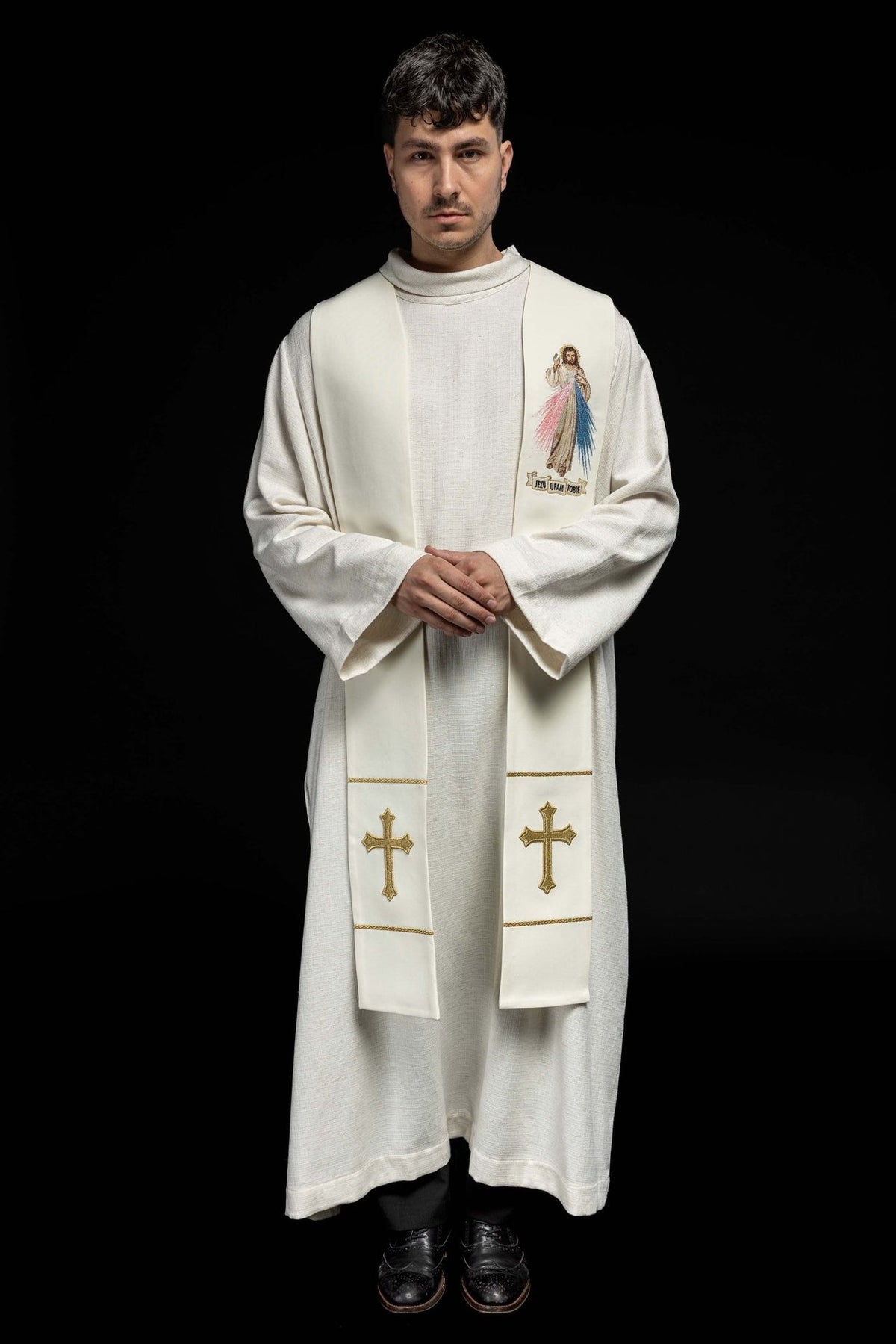 Ecru priest stole worn full front view with Divine Mercy embroidery and gold crosses