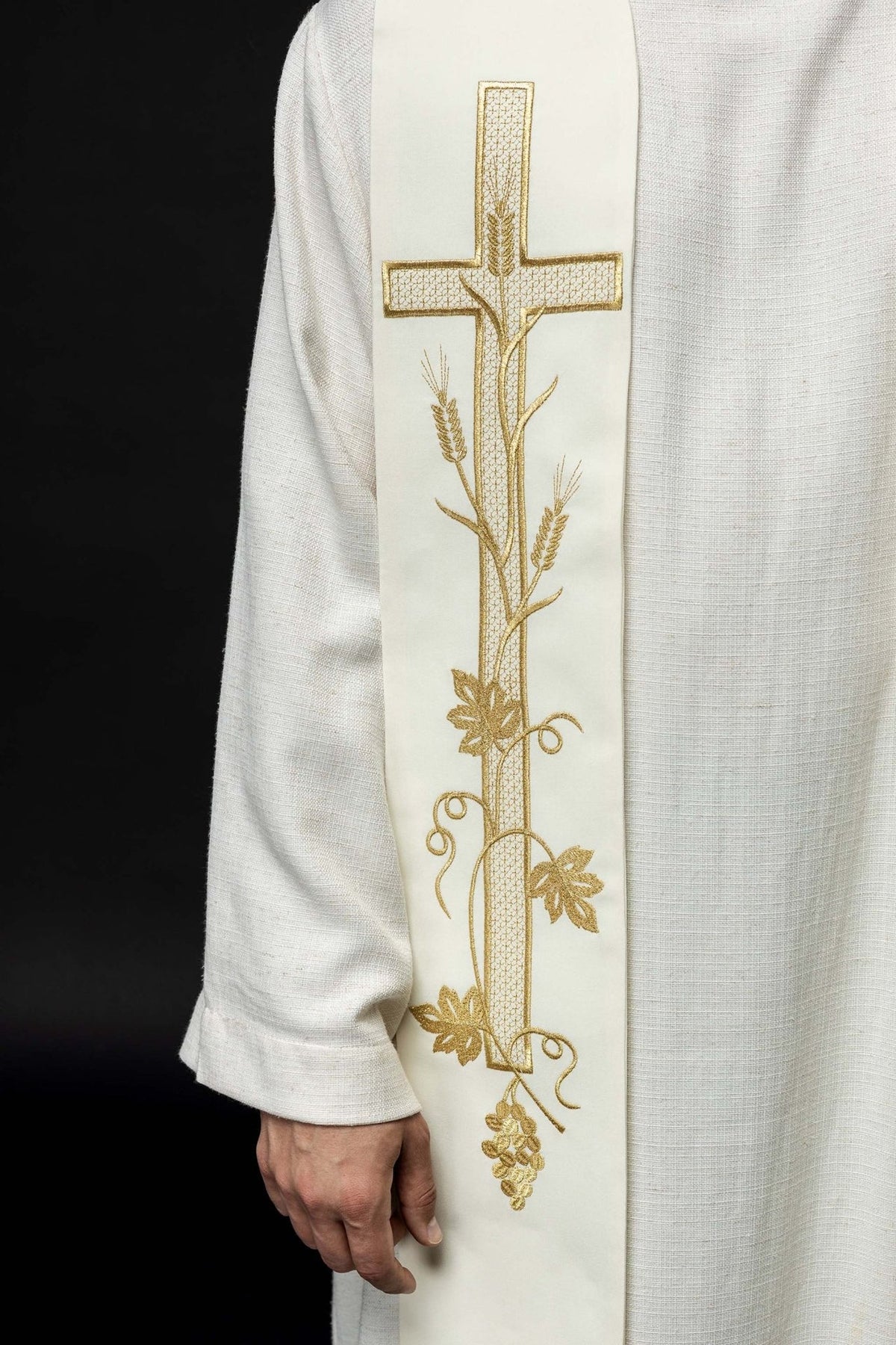 Ecru priest stole close-up showing gold cross, wheat, vine and floral embroidery