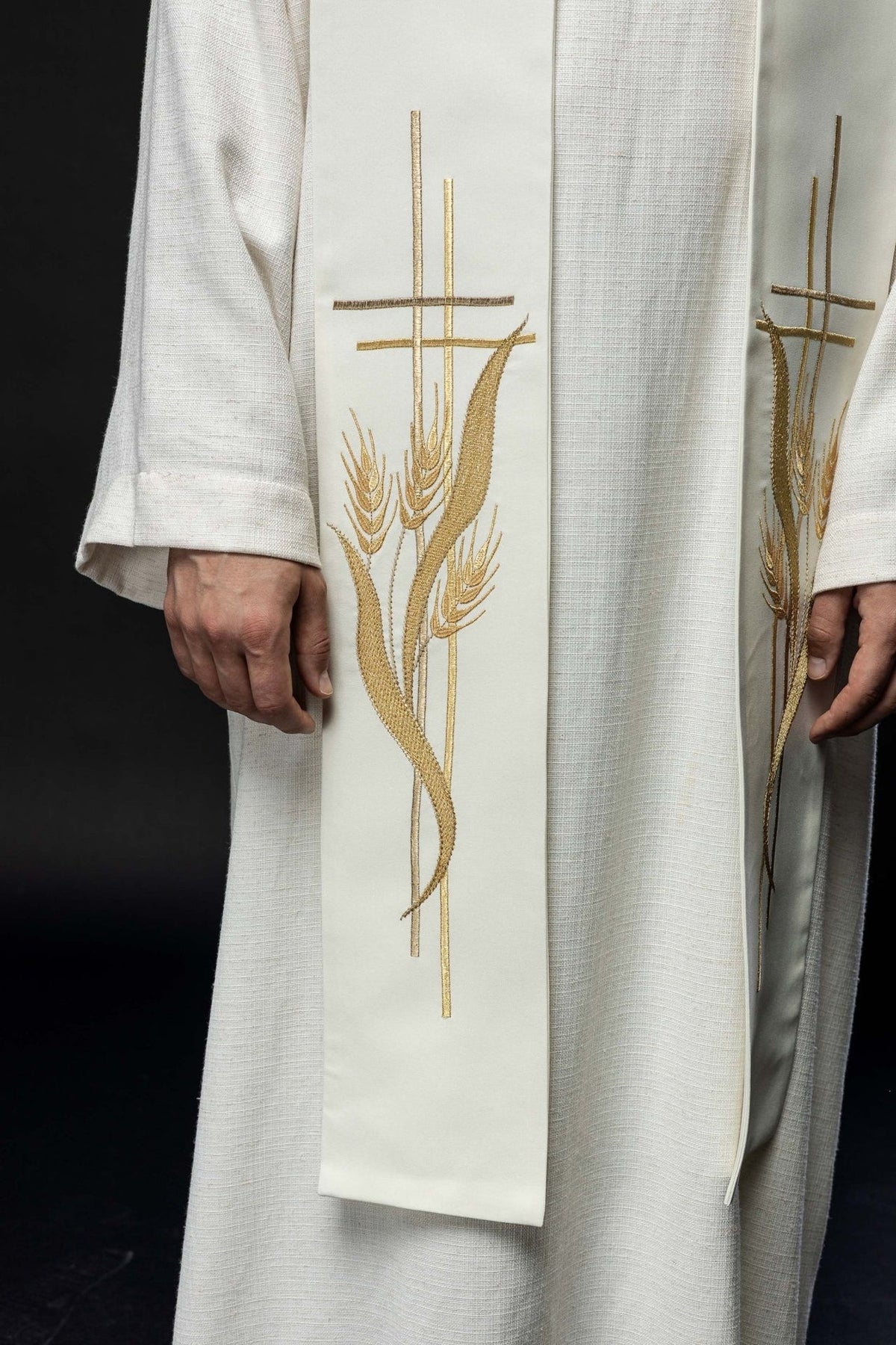 Ecru priest stole close-up showing ornate cross and wheat embroidery