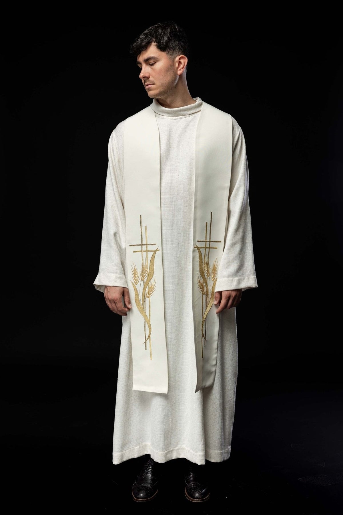 Ecru priest stole front view worn with gold cross and wheat embroidery