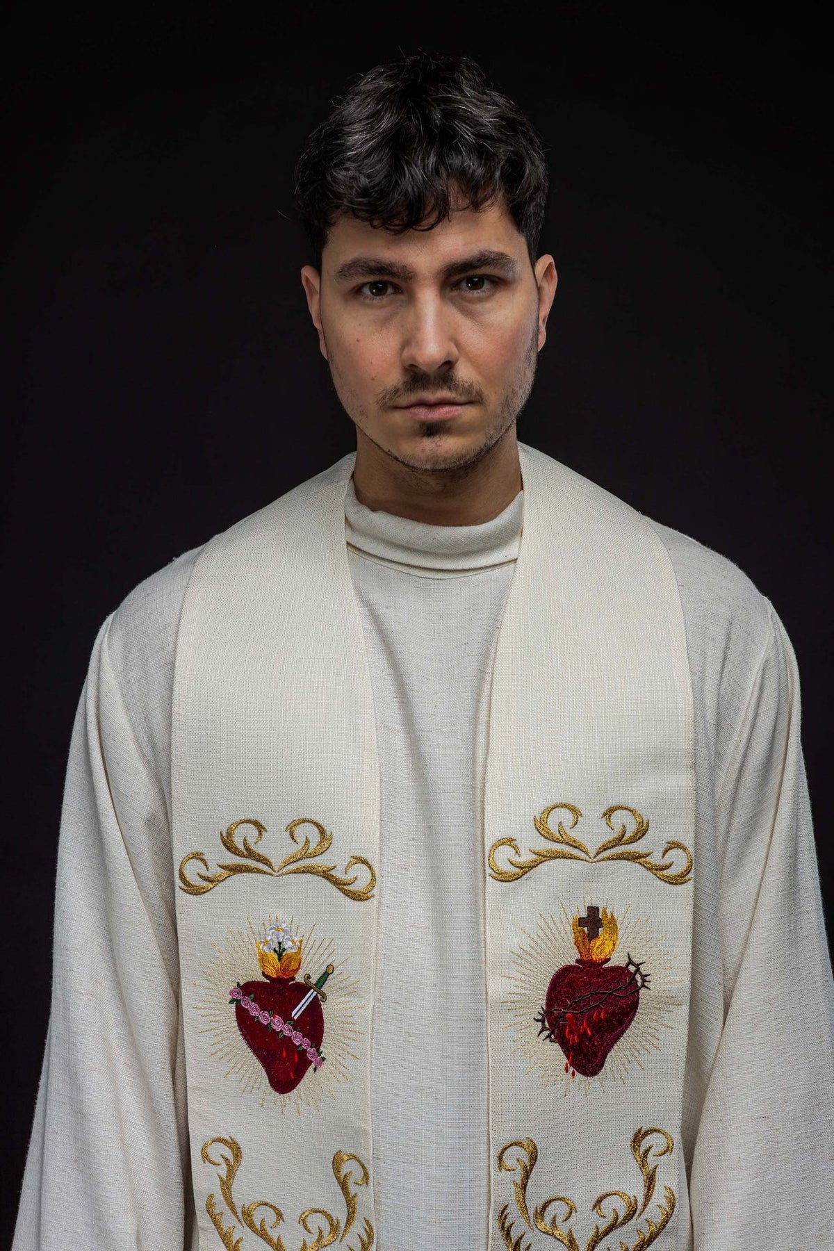 Ecru embroidered stole close-up with Sacred Heart of Jesus and Mary