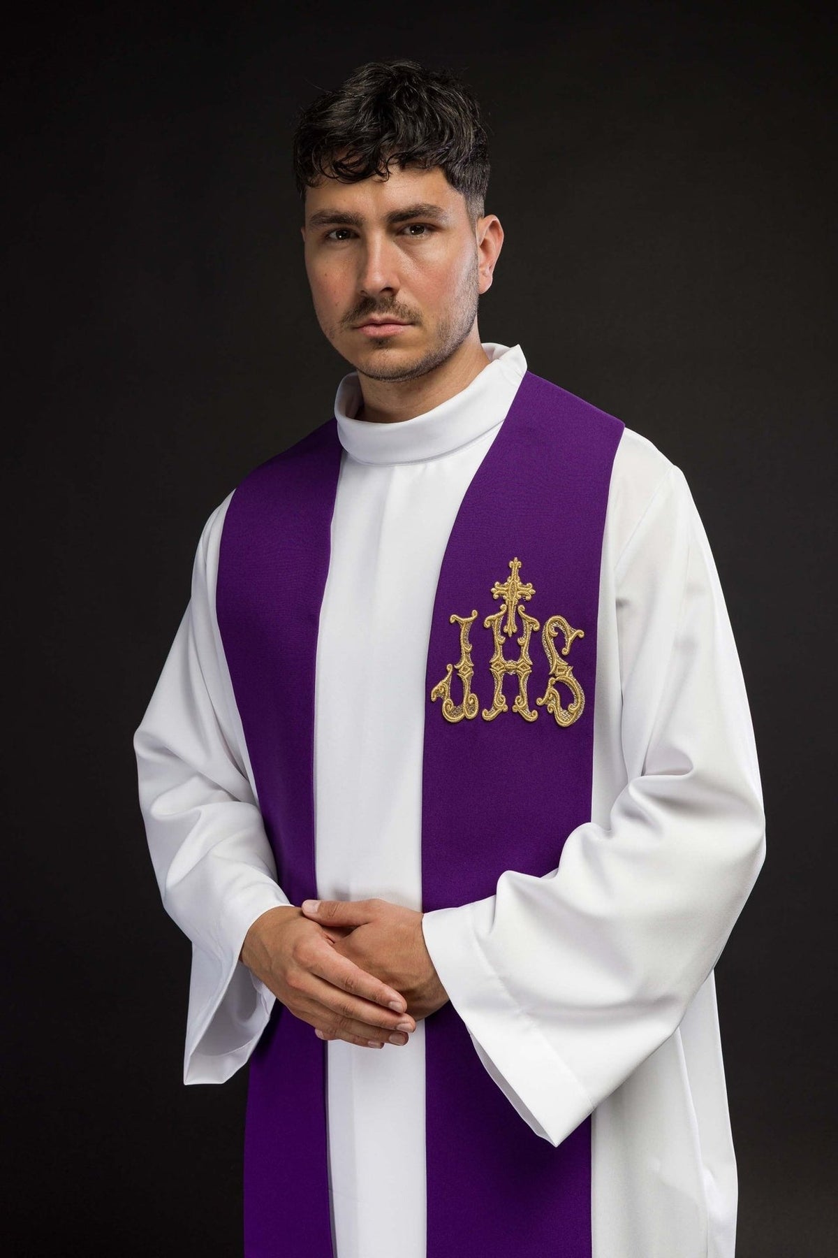 Purple priest stole worn from the front, showing gold IHS embroidery
