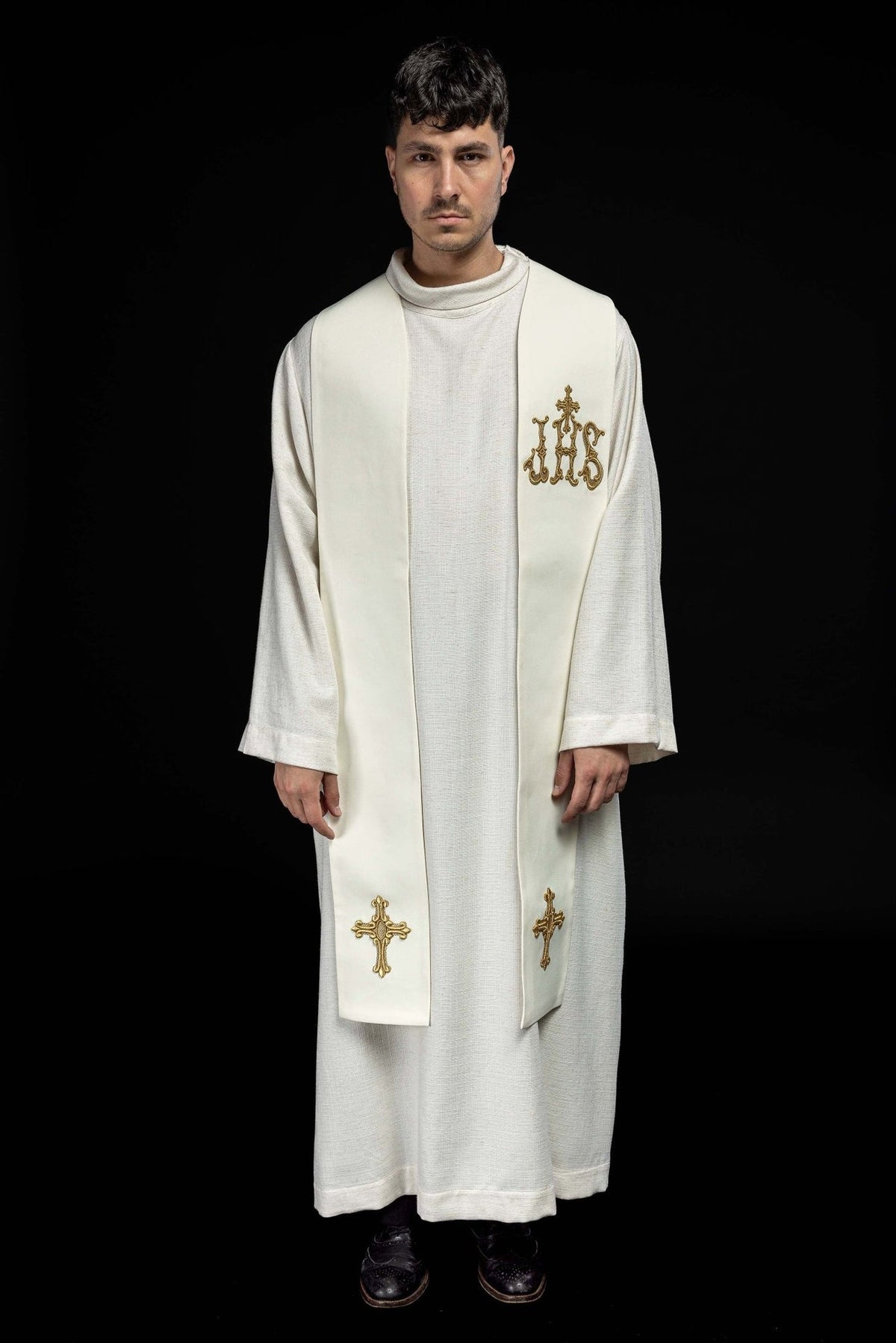 Ecru priest stole full front view worn with gold crosses and IHS embroidery