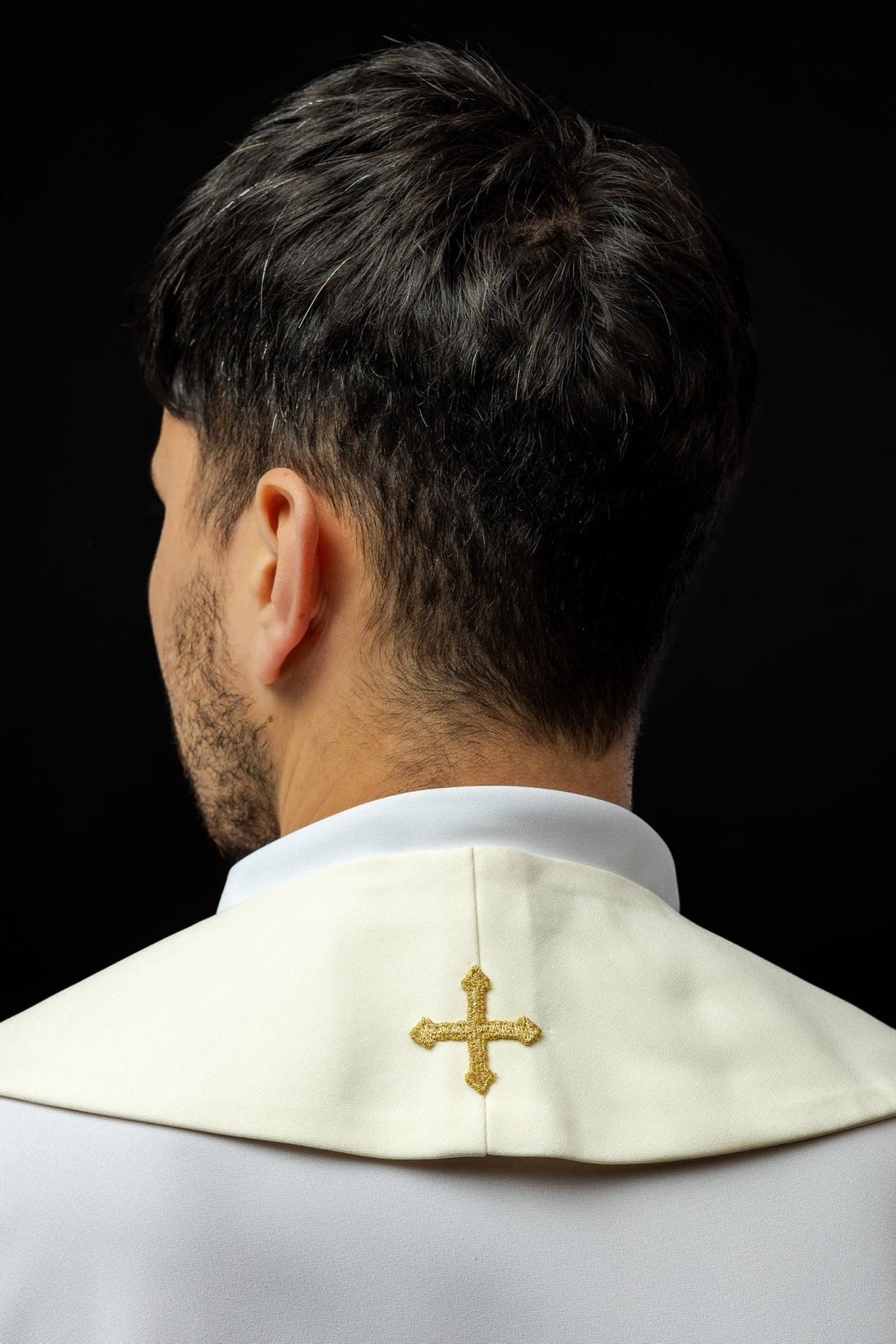 Ecru stole back view showing a small embroidered cross at the neck