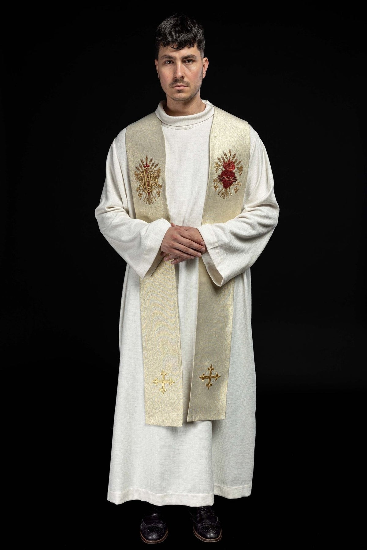 Gold priest stole worn full front view with embroidered Sacred Heart of Jesus and crosses