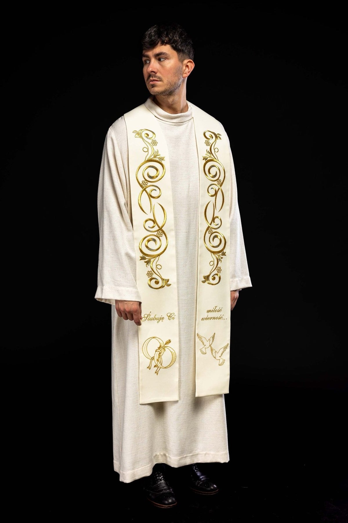 Cream embroidered wedding stole worn front-facing with gold scrolls, rings and doves