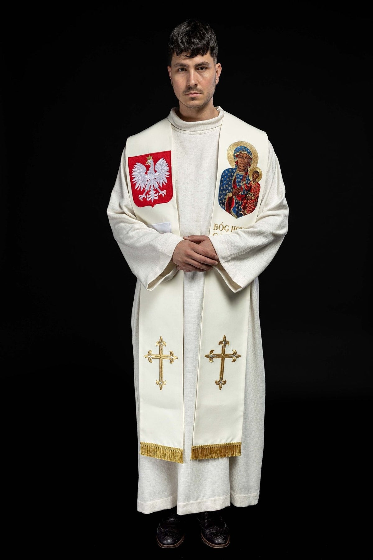 White embroidered stole worn in full front view with Marian symbol, crosses and gold fringe