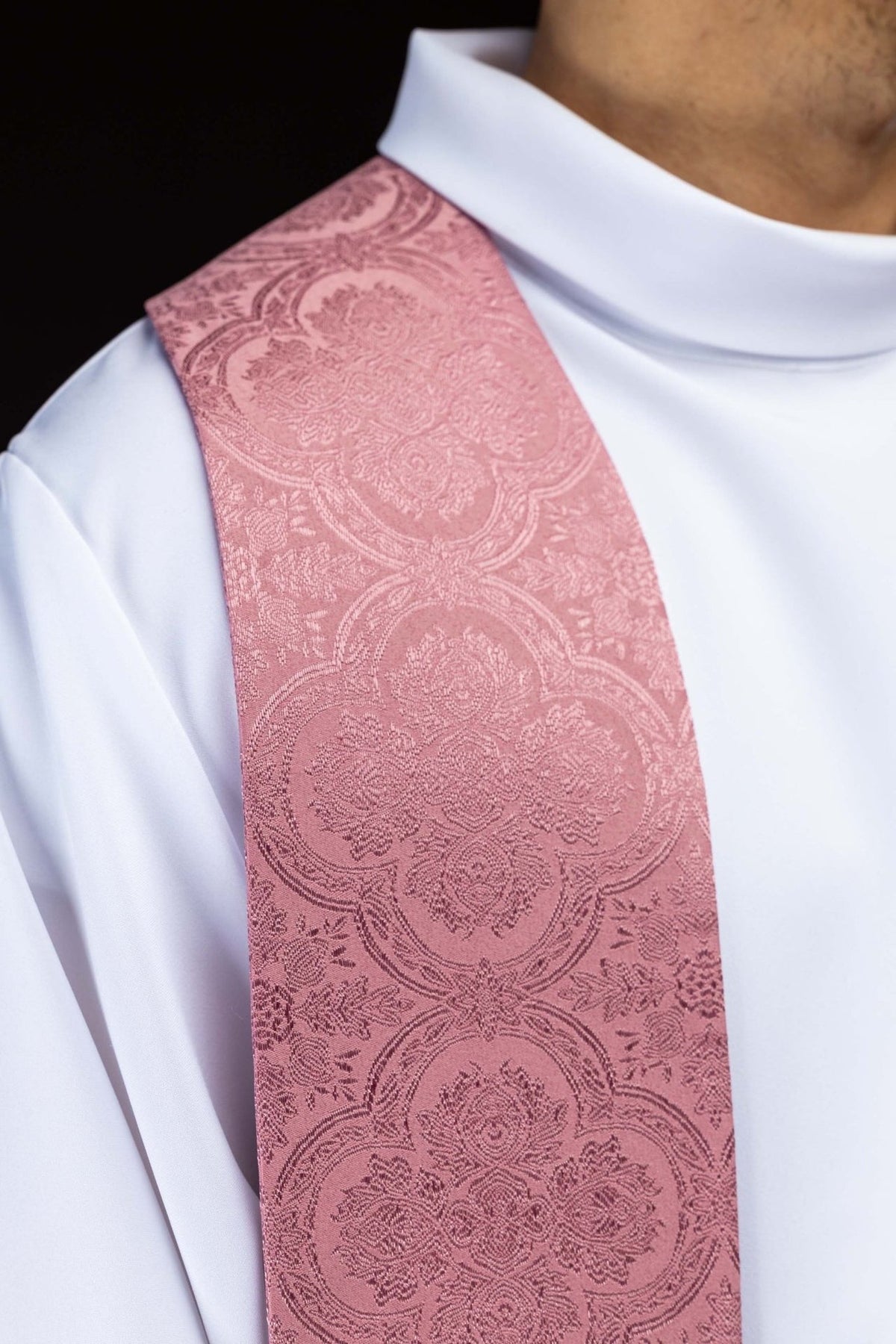 Rose stole worn close-up showing jacquard floral motifs