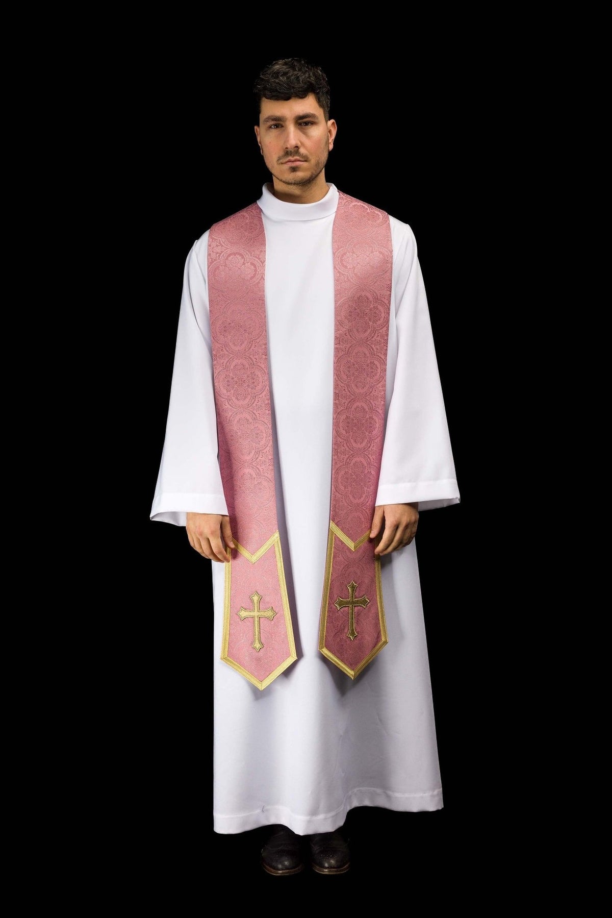 Rose stole worn front view showing paired panels, gold edging and crosses