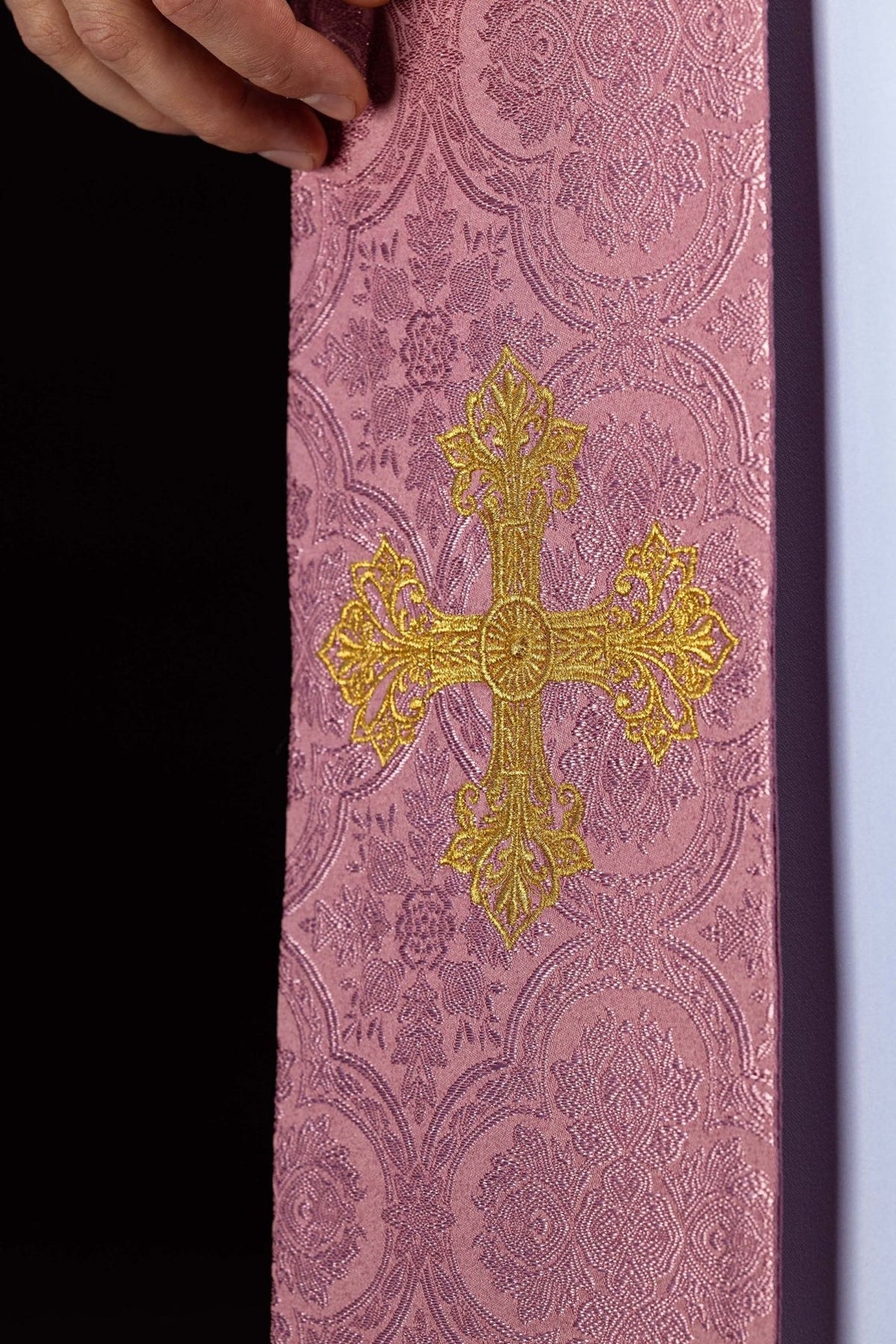 Rose stole close-up showing its rose jacquard fabric and repeating floral motif