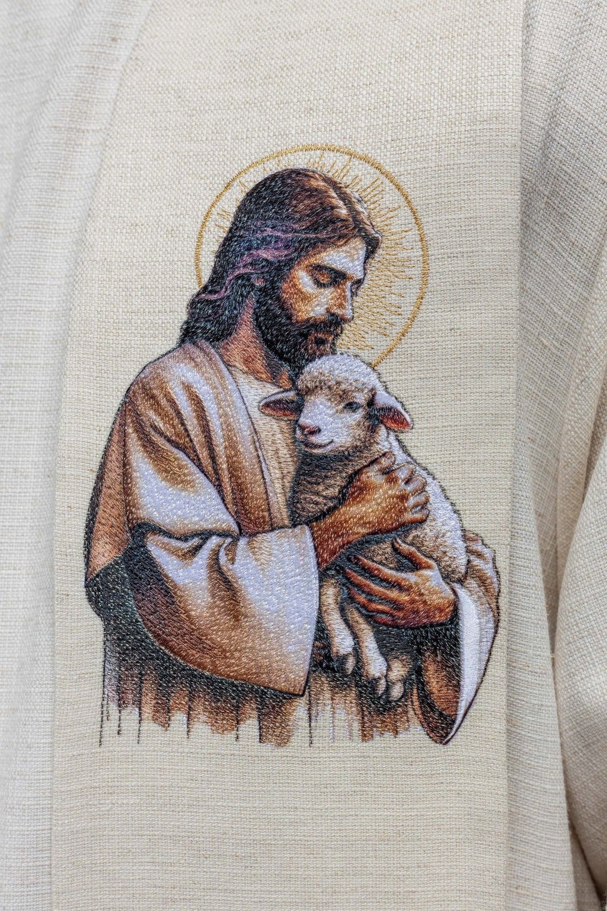 Good Shepherd stole close-up showing embroidered Jesus holding a lamb