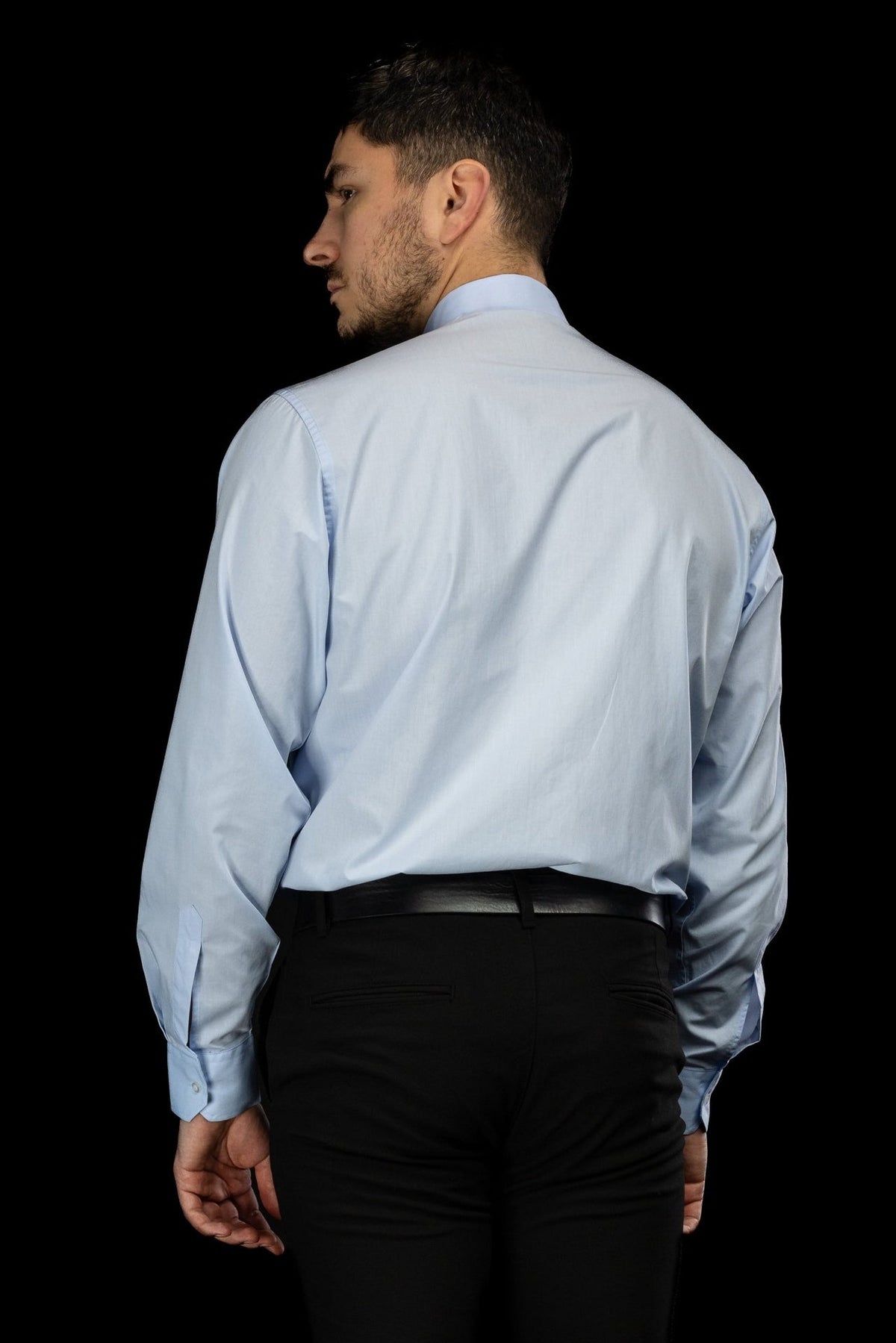 Light blue clergy shirt back view with long sleeves
