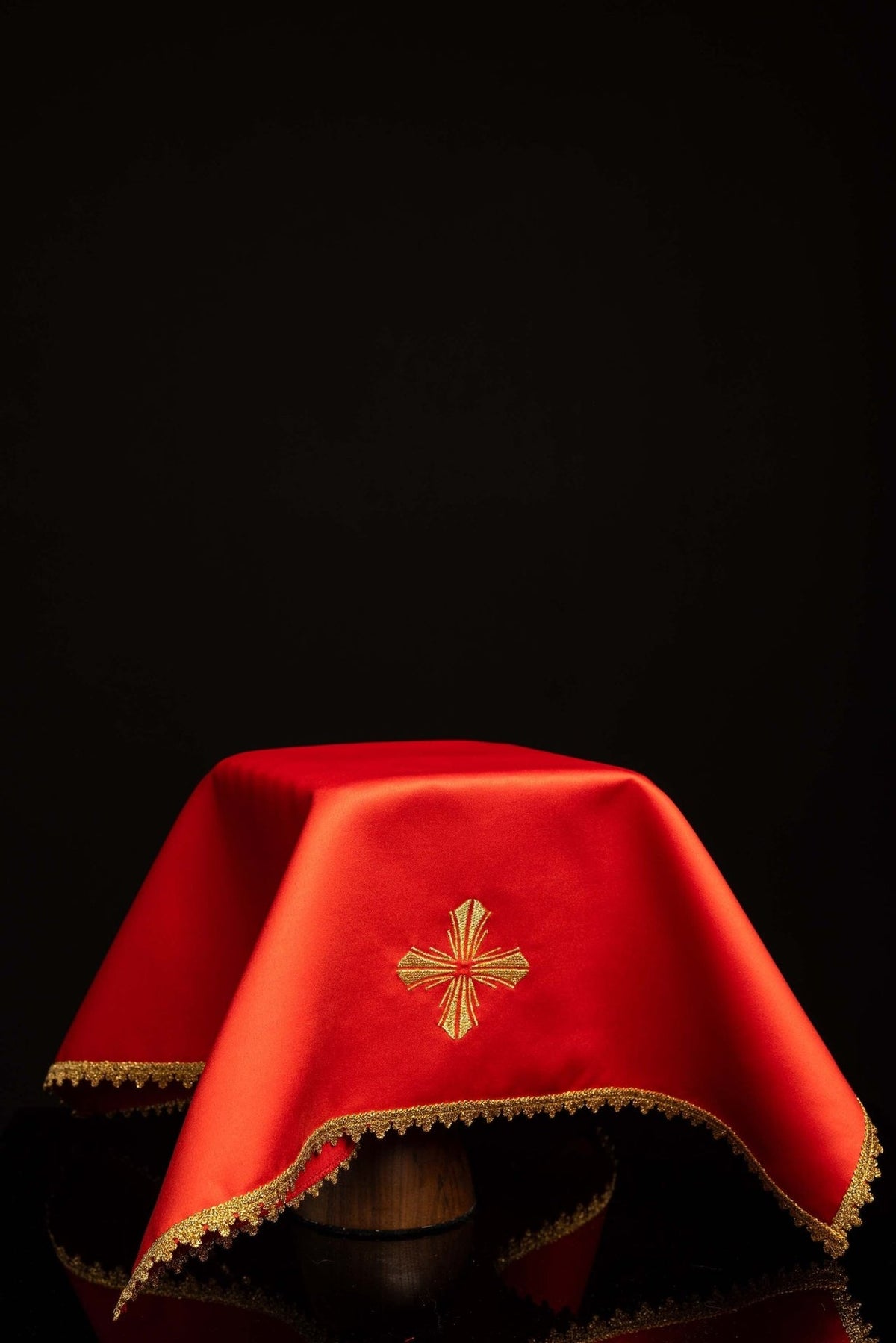 Red chalice veil with embroidered gold cross and gold trim