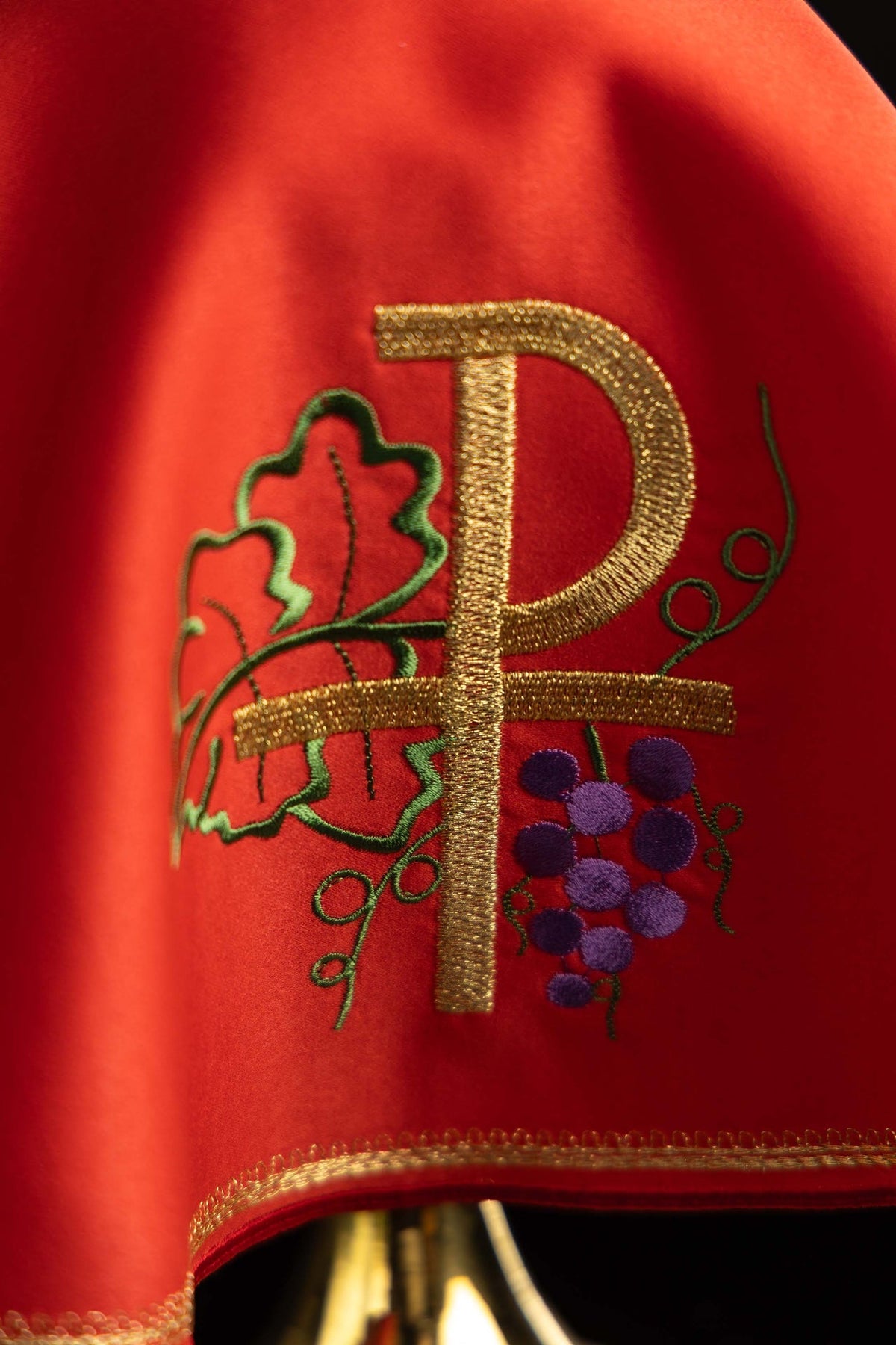 Ciborium veil close-up showing gold PAX, wheat and grape embroidery
