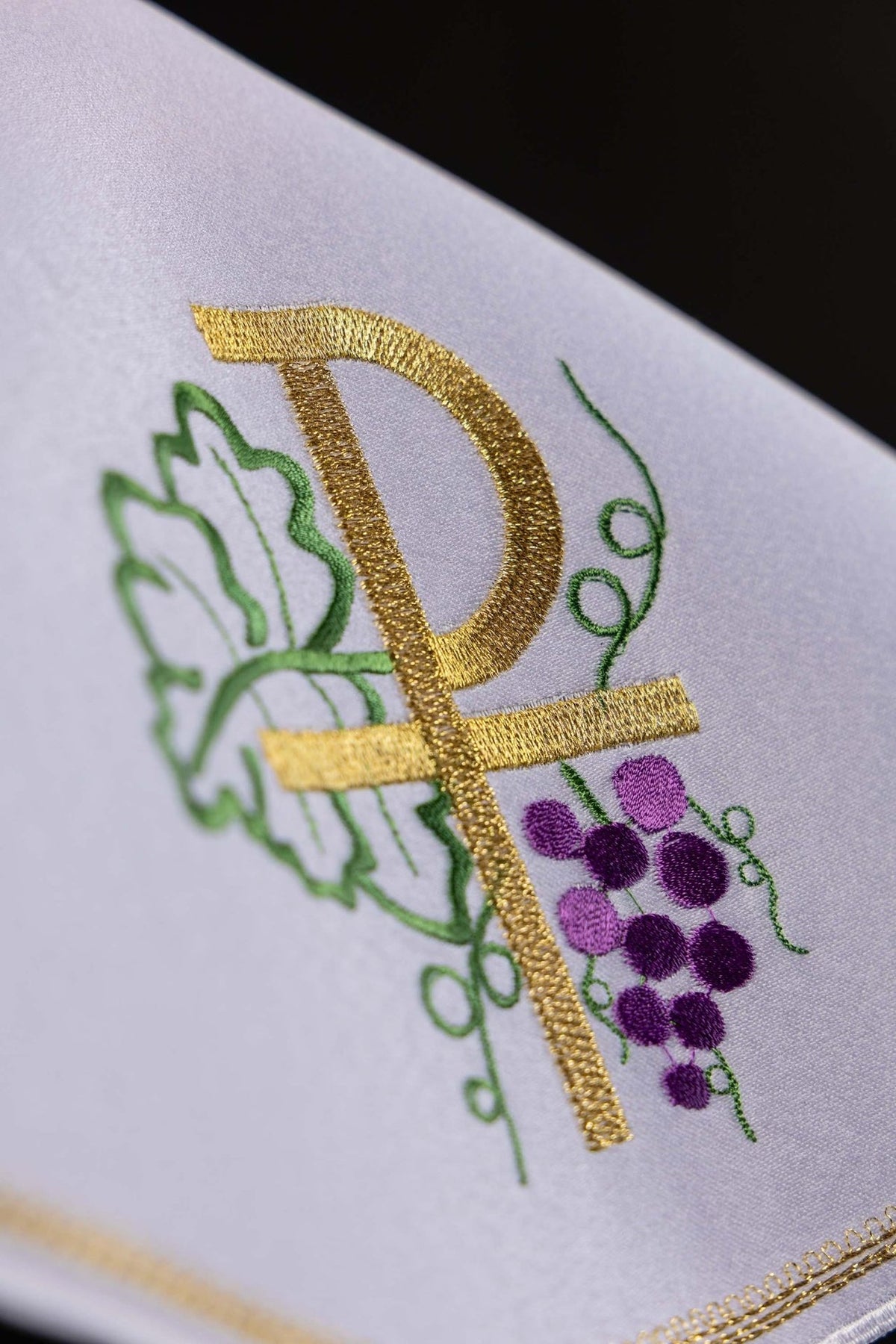 White ciborium veil, close-up of gold PAX embroidery with vine and grapes