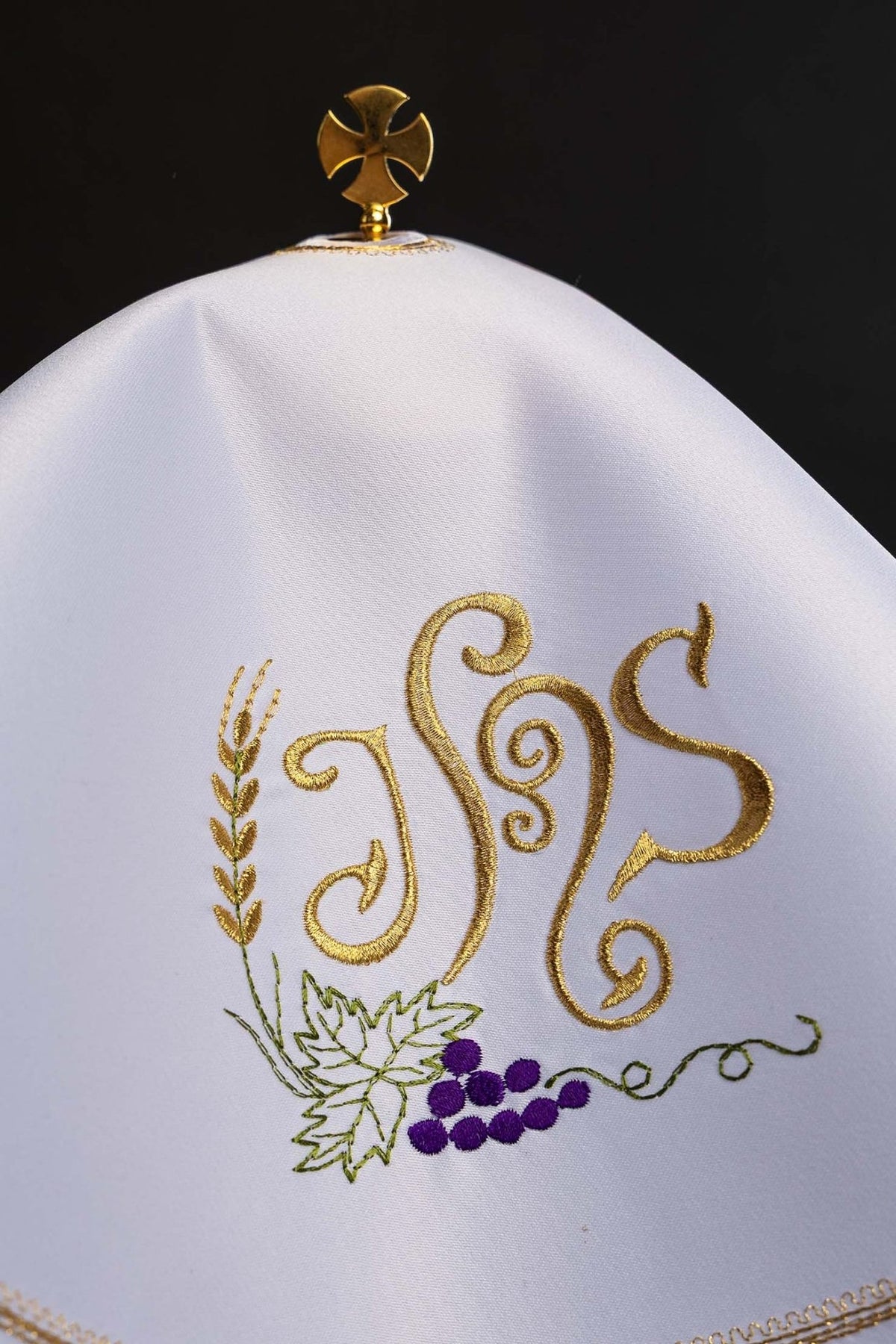 Ciborium veil close-up with gold IHS embroidery, wheat and purple grapes