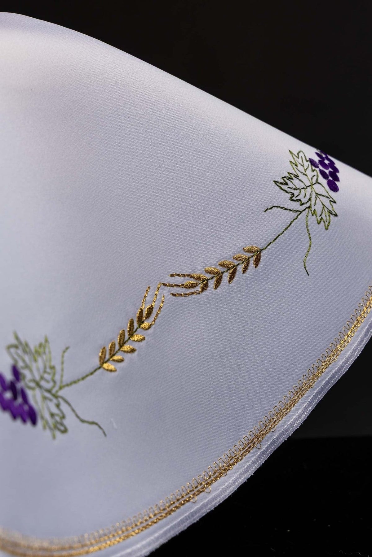 Ciborium veil detail with gold wheat embroidery, purple grapes and gold edging