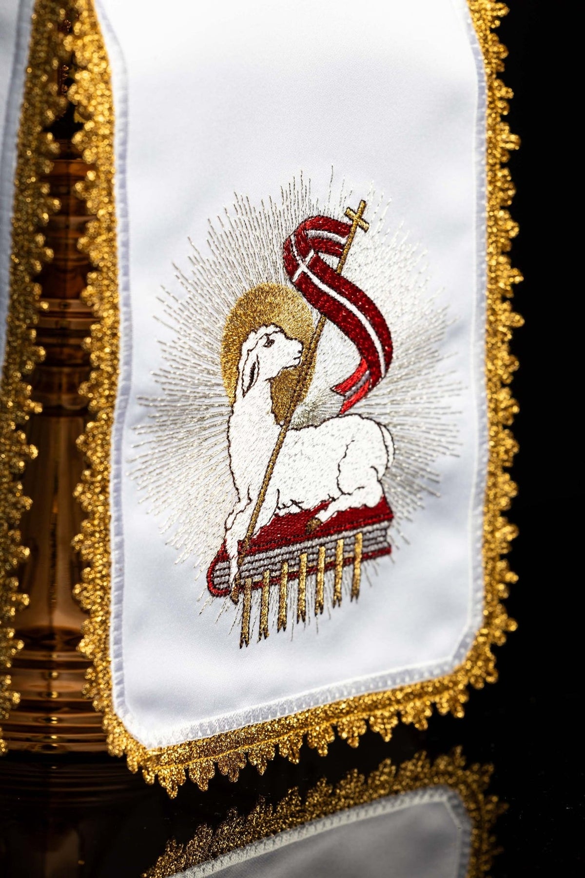 White ciborium veil close-up with Paschal Lamb embroidery and gold trim