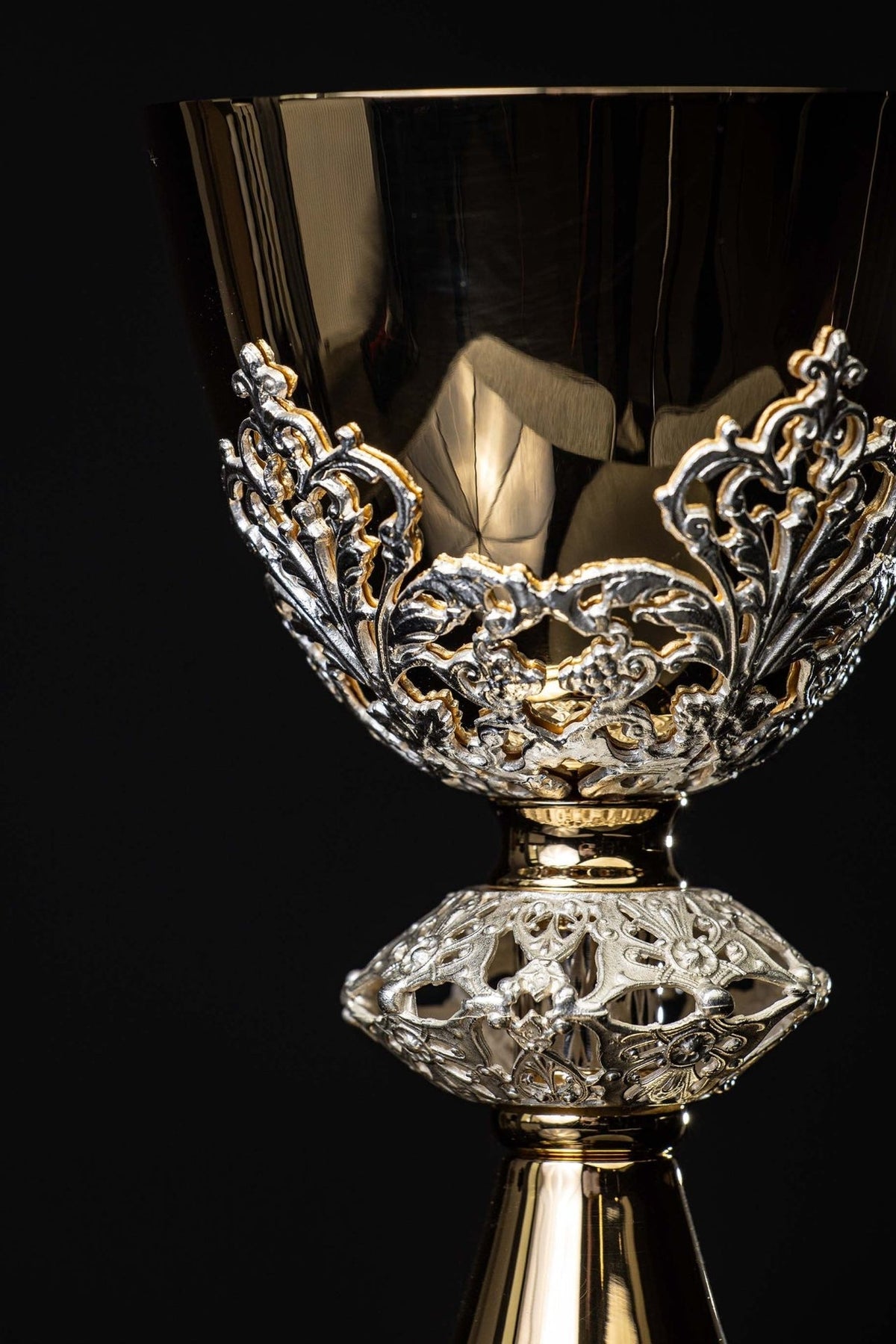Gold-plated brass chalice upper close-up showing ornate silver floral embellishments