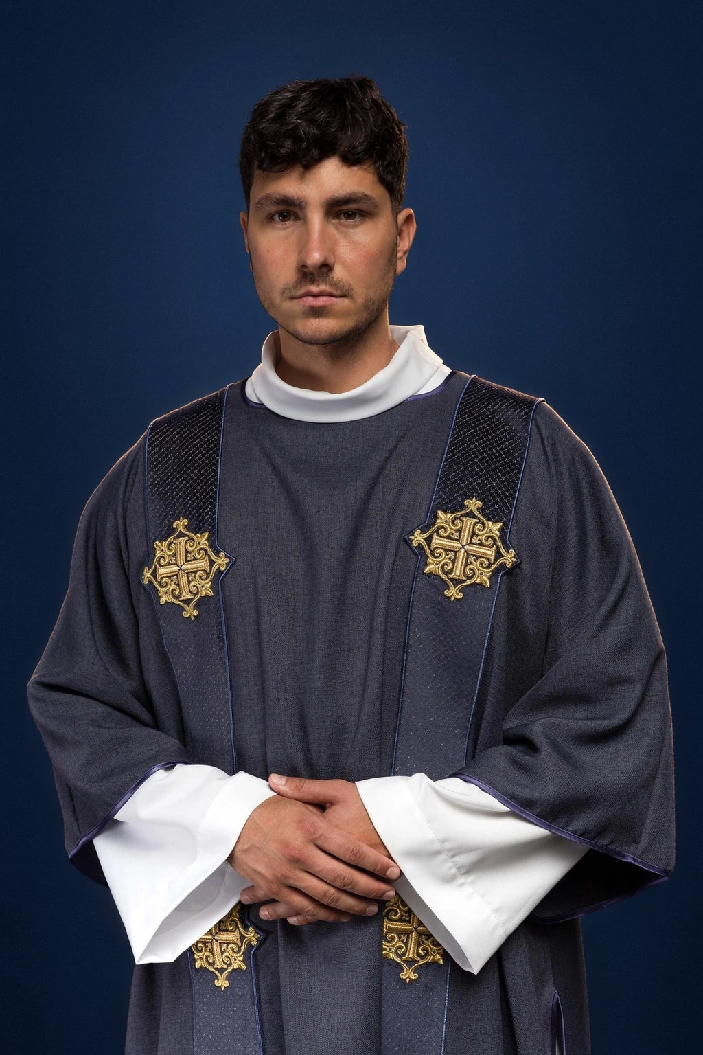 Purple Velvet Dalmatic with Orphreys and Embroidered Cross Symbols, front view with gold embroidery