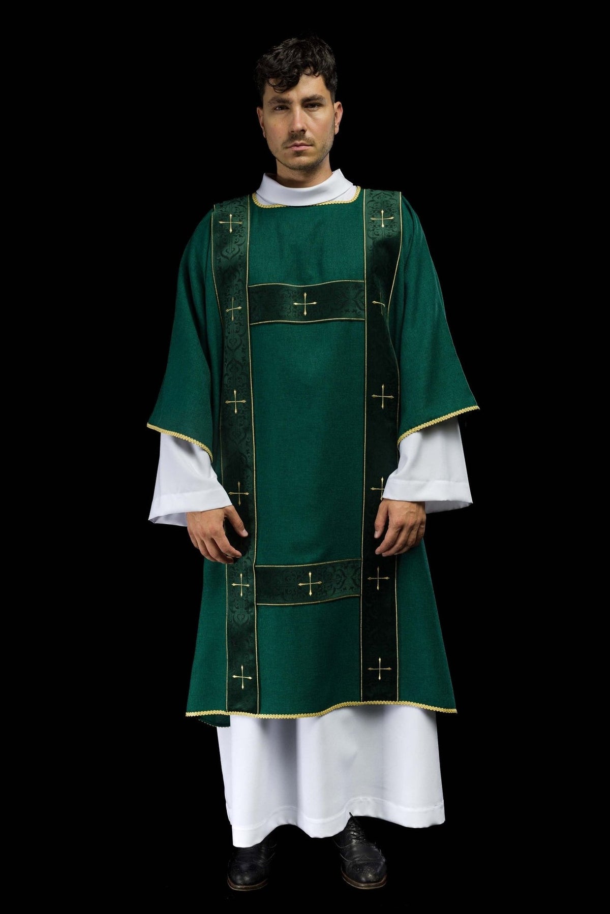 Green dalmatic front view with velvet orphrey and embroidered gold crosses