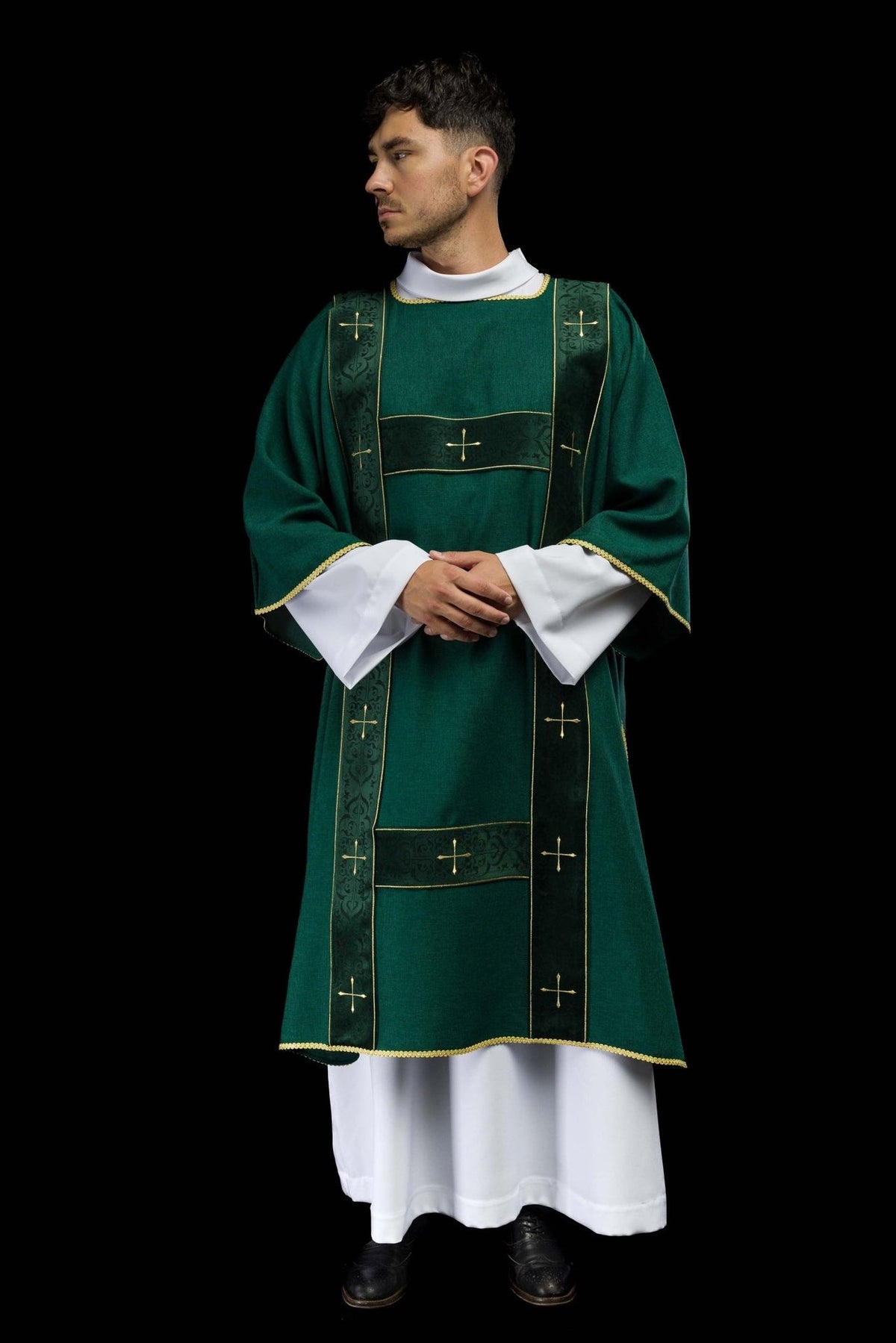 Green dalmatic front view with velvet orphreys and gold cross embroidery