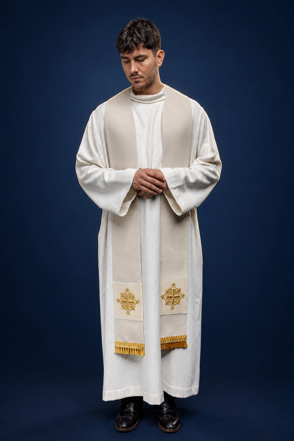 Ecru Velvet Stole with Embroidered Cross Symbol worn front view with gold embroidery and fringe